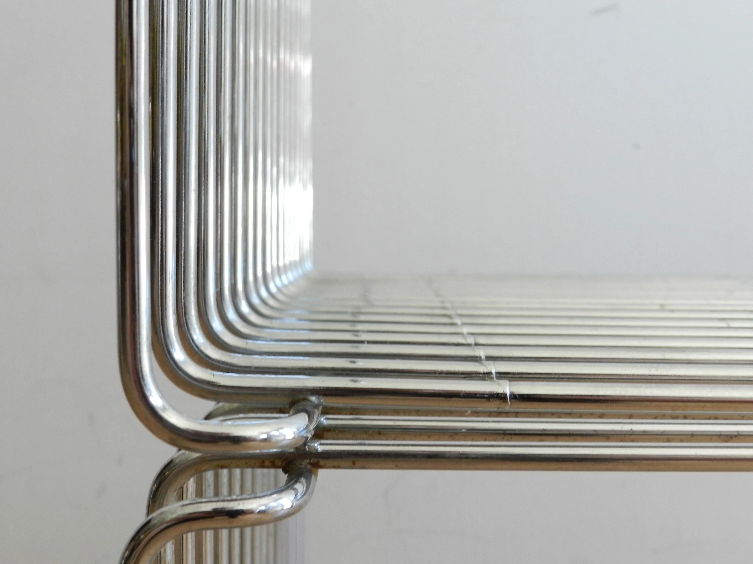 Pair of vintage wire cubes designed by Verner Panton for Fritz Hansen. Can used as side tables, shelving or stools.  Denmark, 1970s.