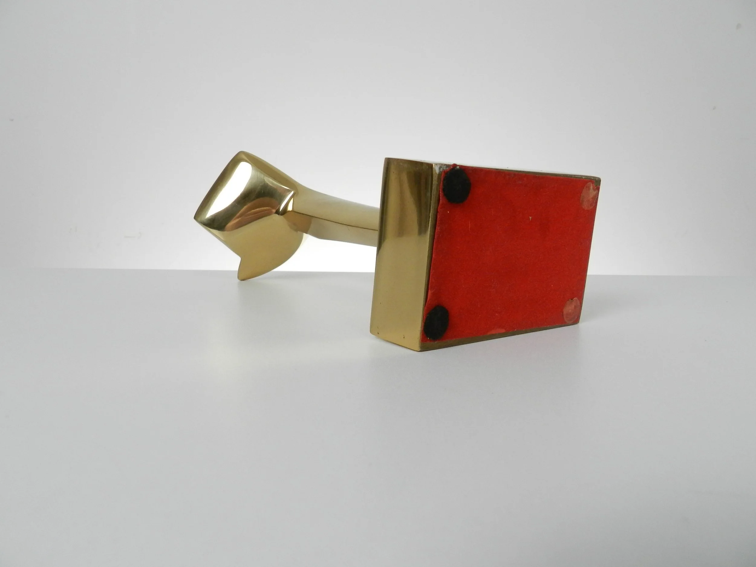 Abstract sculpture in polished bronze by May Marx. Signed on base and leg.  Canada, 1980s.