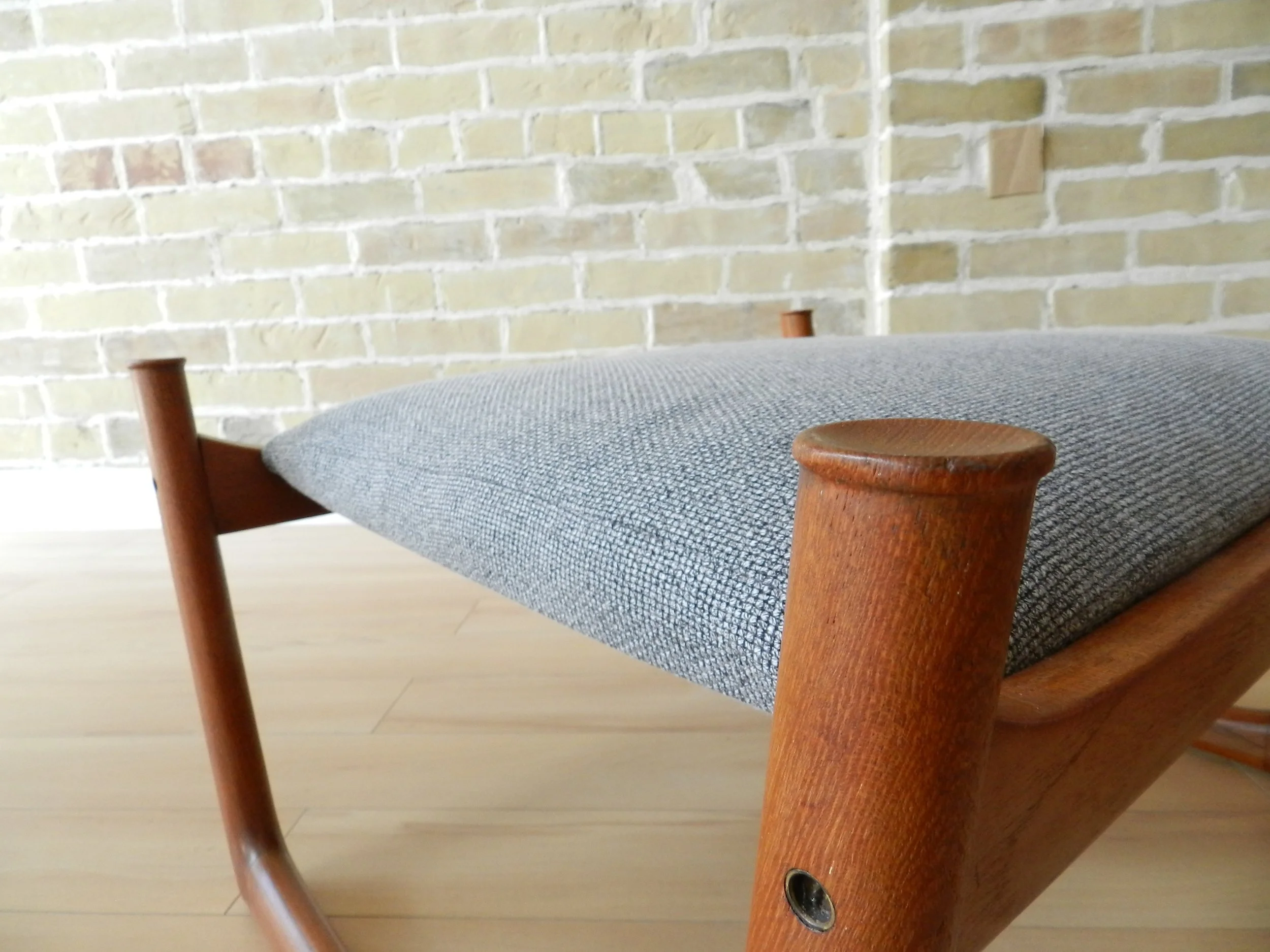 Teak armchair and ottoman model FD-130 designed by Peter Hvidt and Orla Molgaard-Nielsen for France and Sons.  Denmark, 1960s.