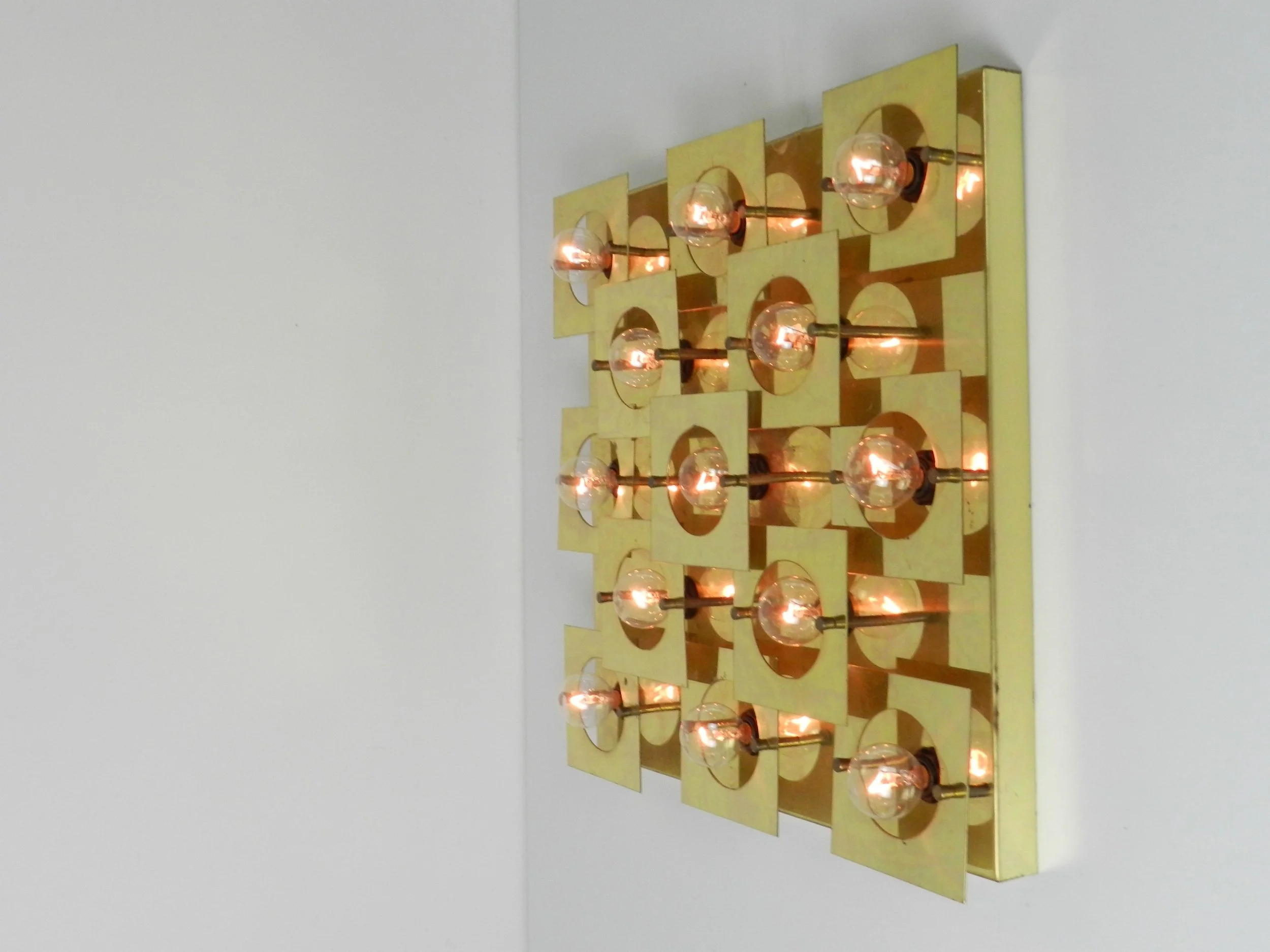 Modernist geometric wall or ceiling lamp in brass. Possibly by Lightolier.  circa 1980s.
