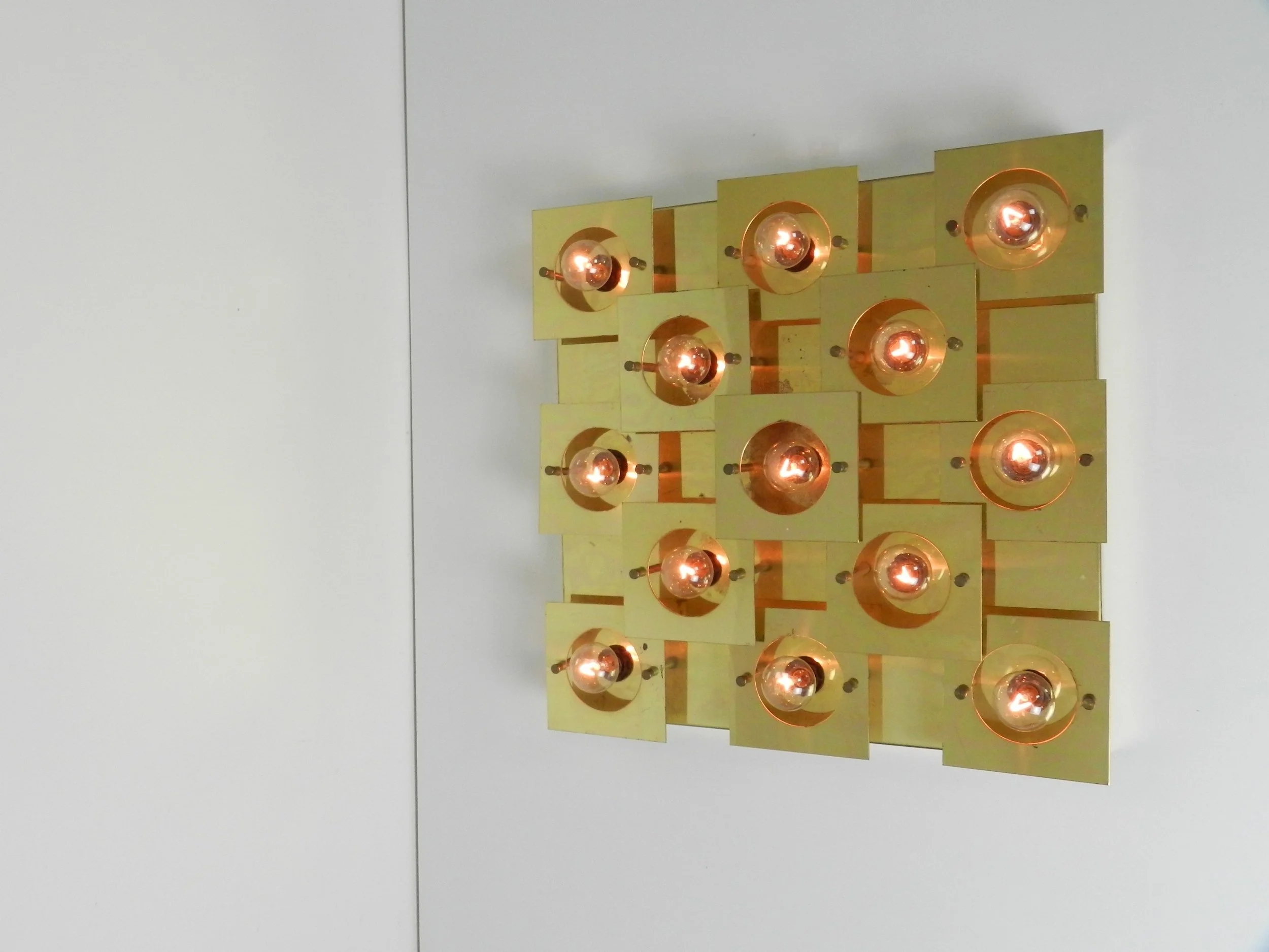 Modernist geometric wall or ceiling lamp in brass. Possibly by Lightolier.  circa 1980s.
