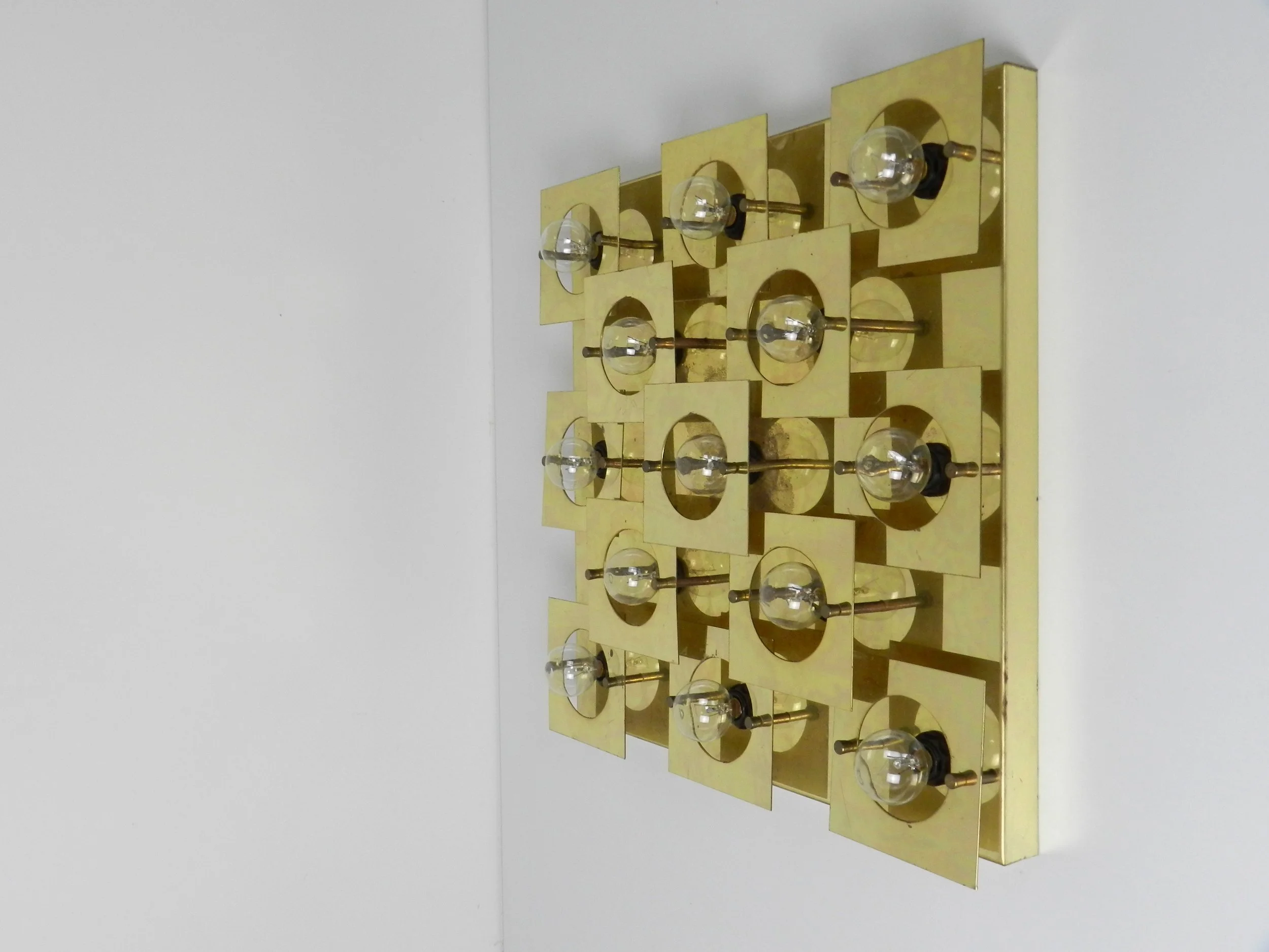 Modernist geometric wall or ceiling lamp in brass. Possibly by Lightolier.  circa 1980s.