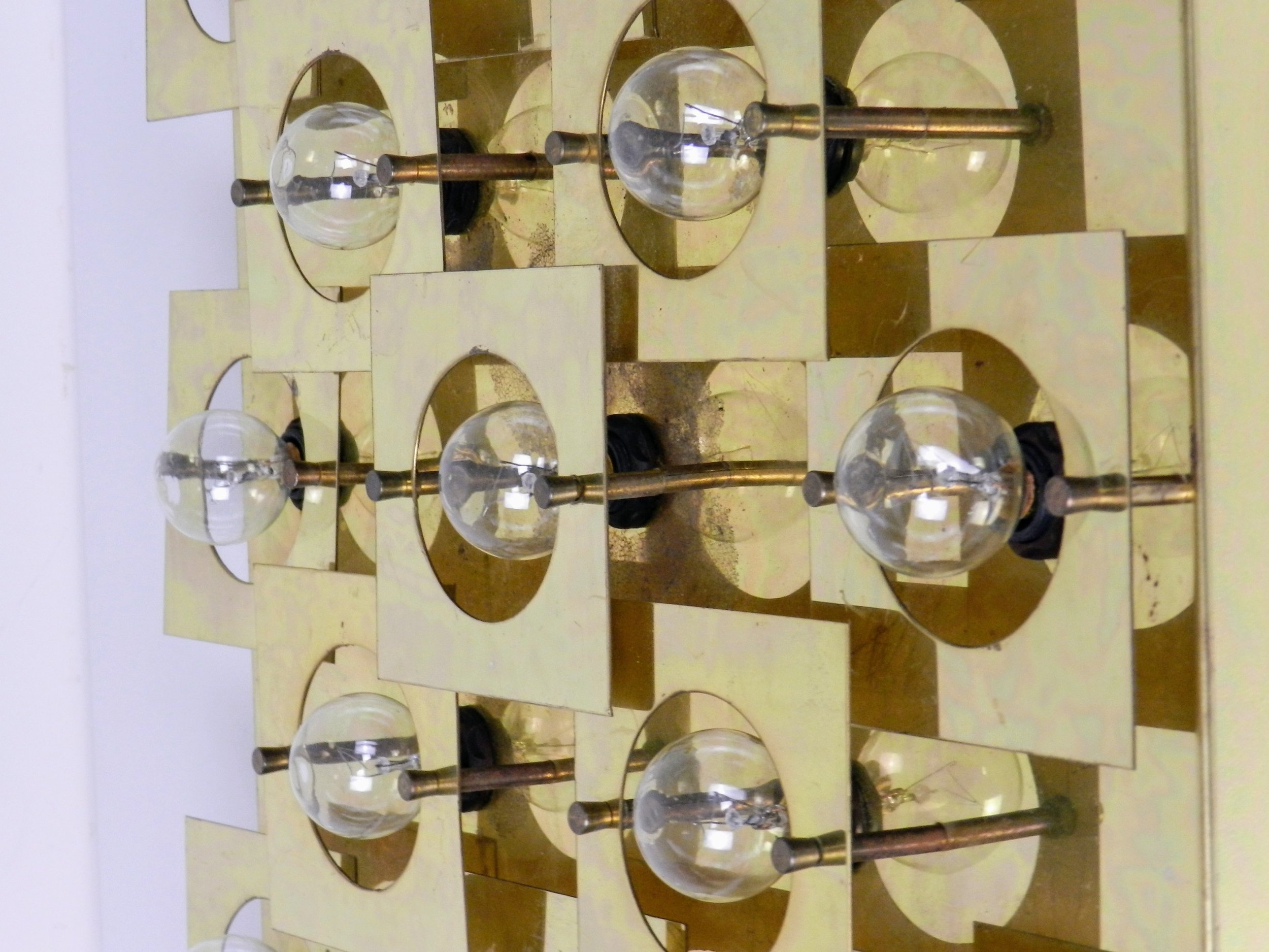 Modernist geometric wall or ceiling lamp in brass. Possibly by Lightolier.  circa 1980s.