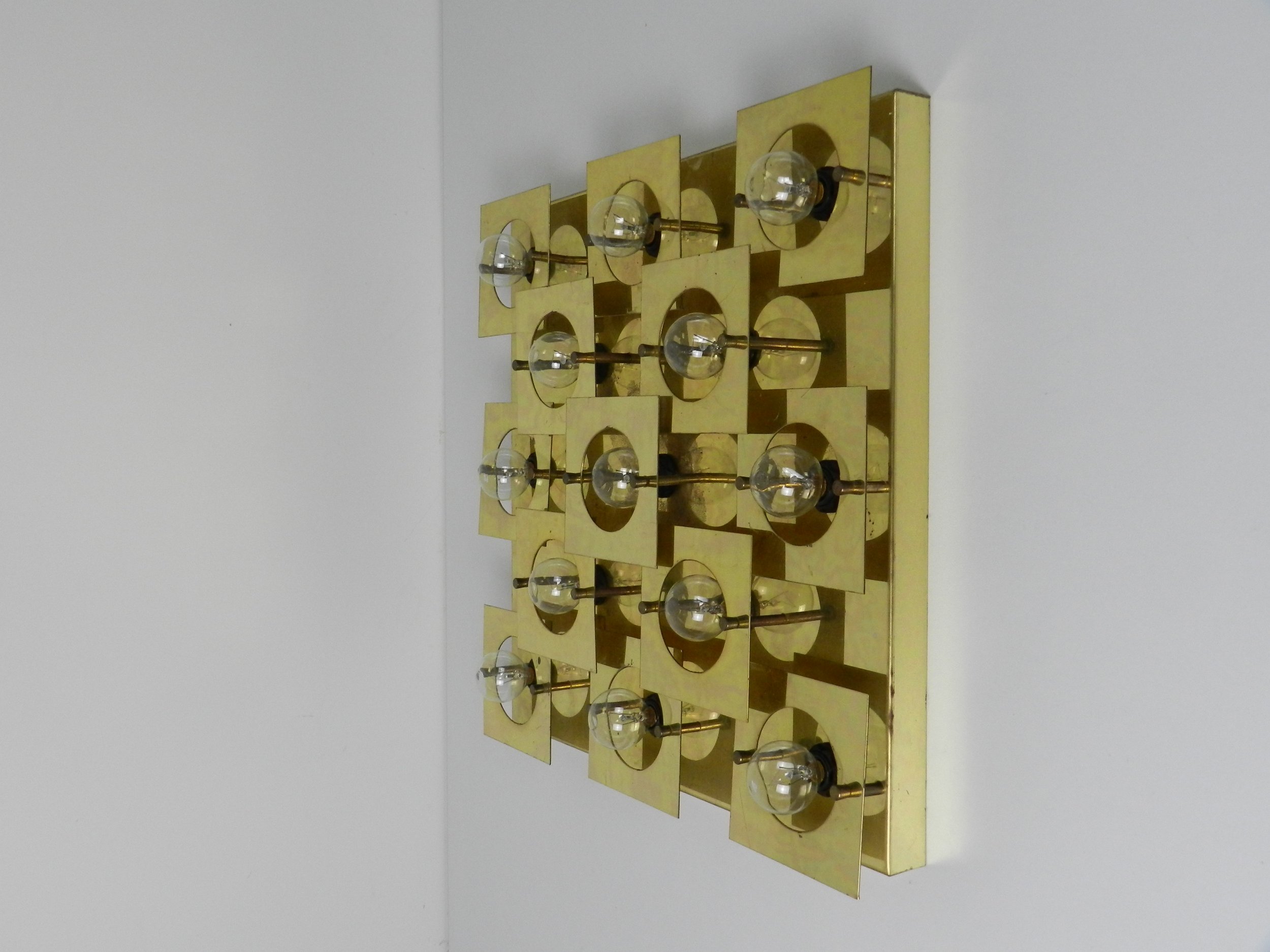 Modernist geometric wall or ceiling lamp in brass. Possibly by Lightolier.  circa 1980s.