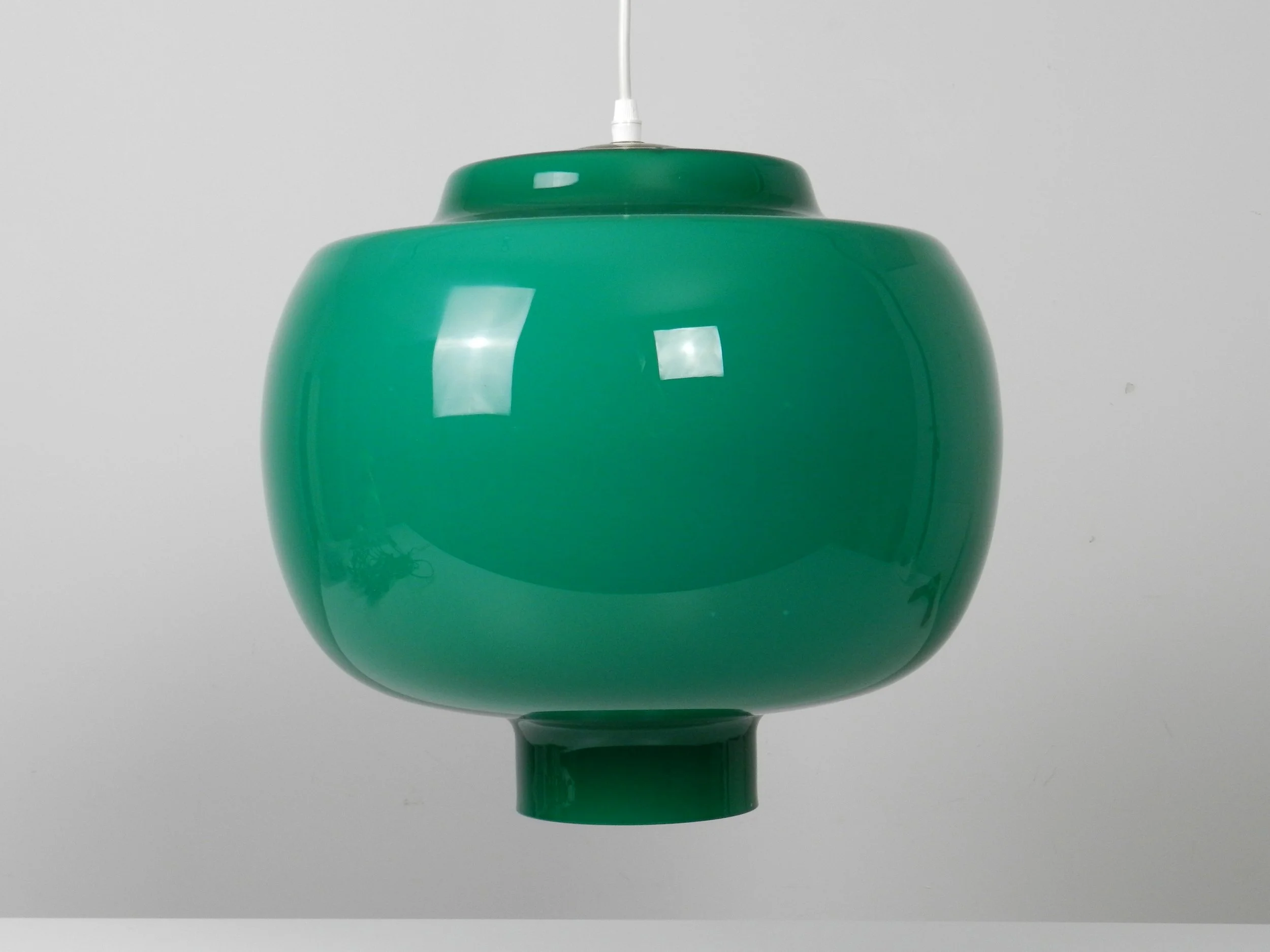 Large Murano green cased glass pendant lamp by Vistosi.  Italy, 1960s.