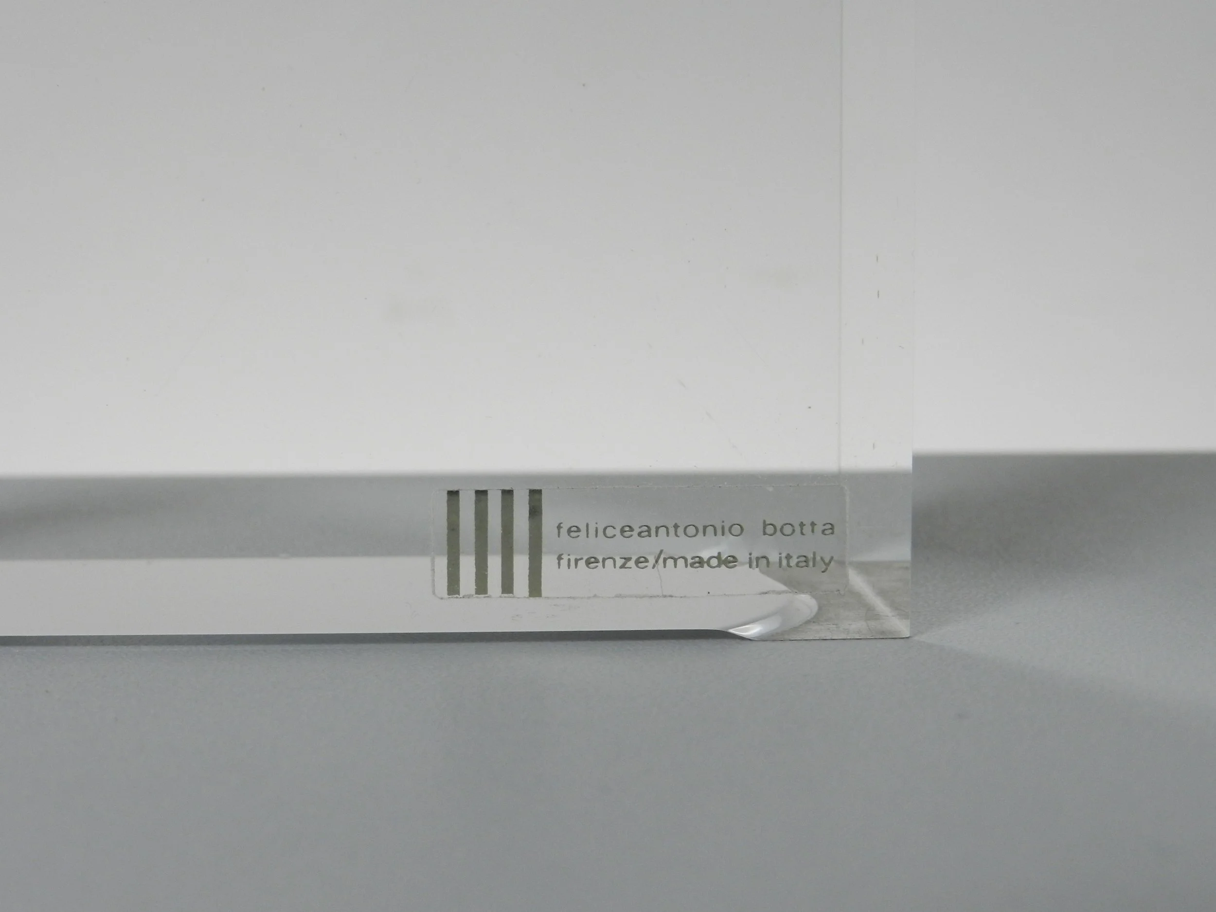 Modernist lucite clock designed by Felice Antonio Botta.  Italy, 1980s.