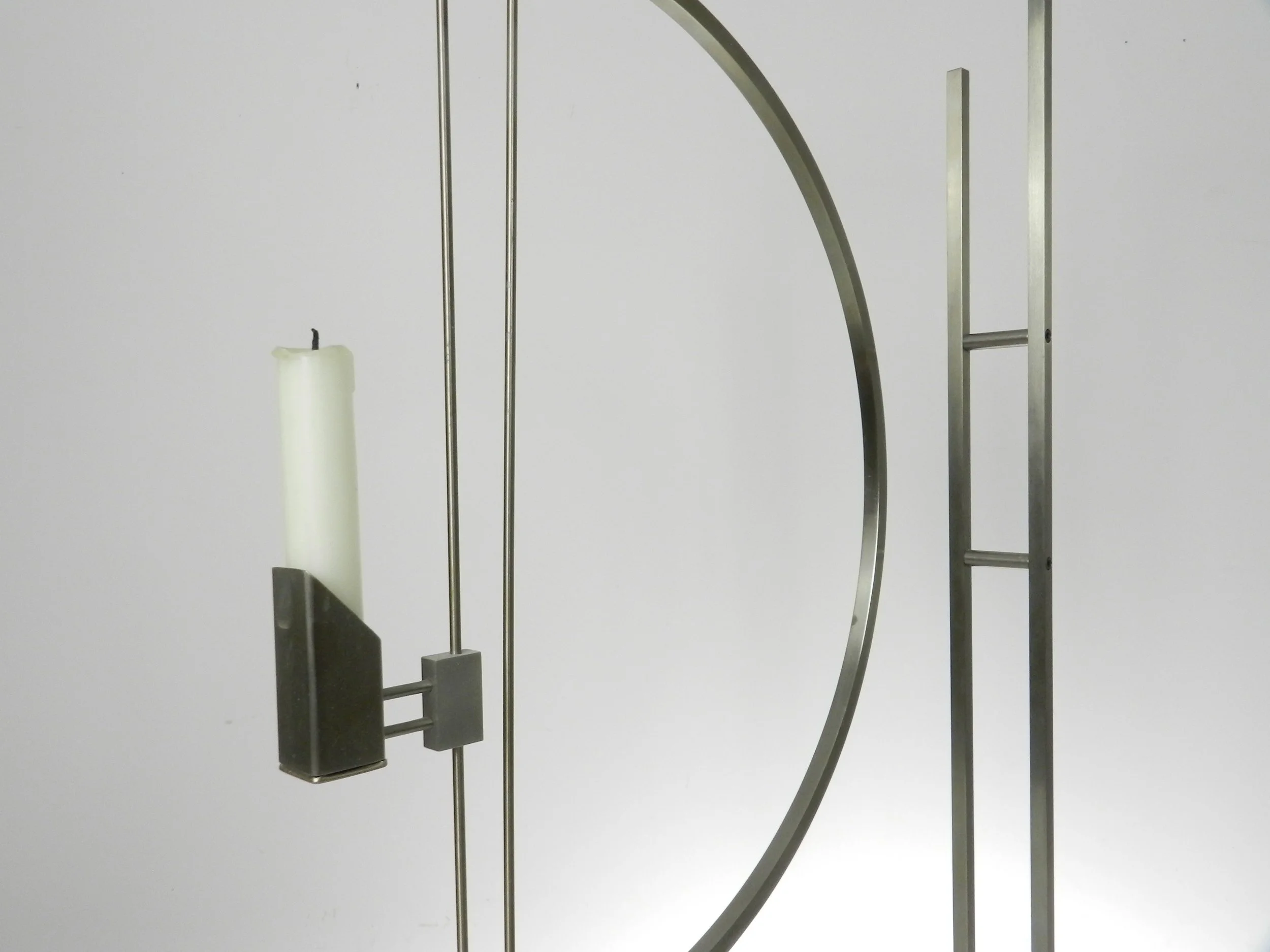Pair of modernist stainless steel candle holders designed by David Zelman for Prologue 2000.  USA, 1980s.
