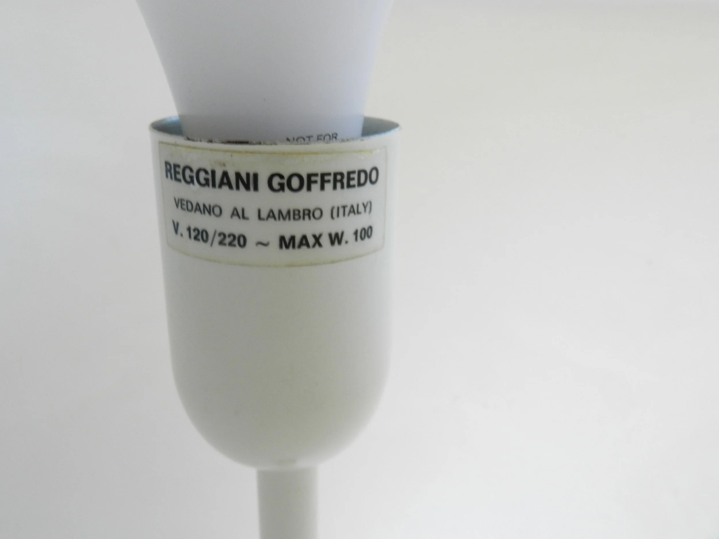 Monumental floor lamp designed by Goffredo Reggiani. Chromed steel with plastic shade.  Italy, 1970s.