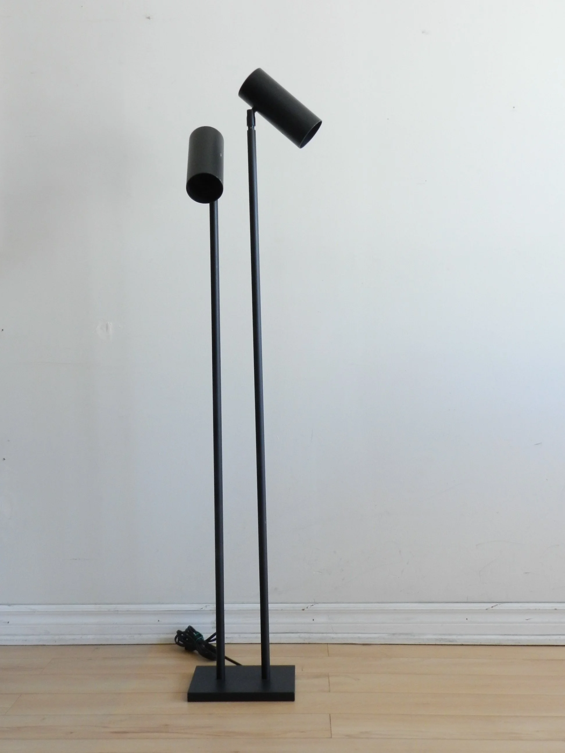 Modernist double head floor lamp in enameled metal.  circa 1980s.