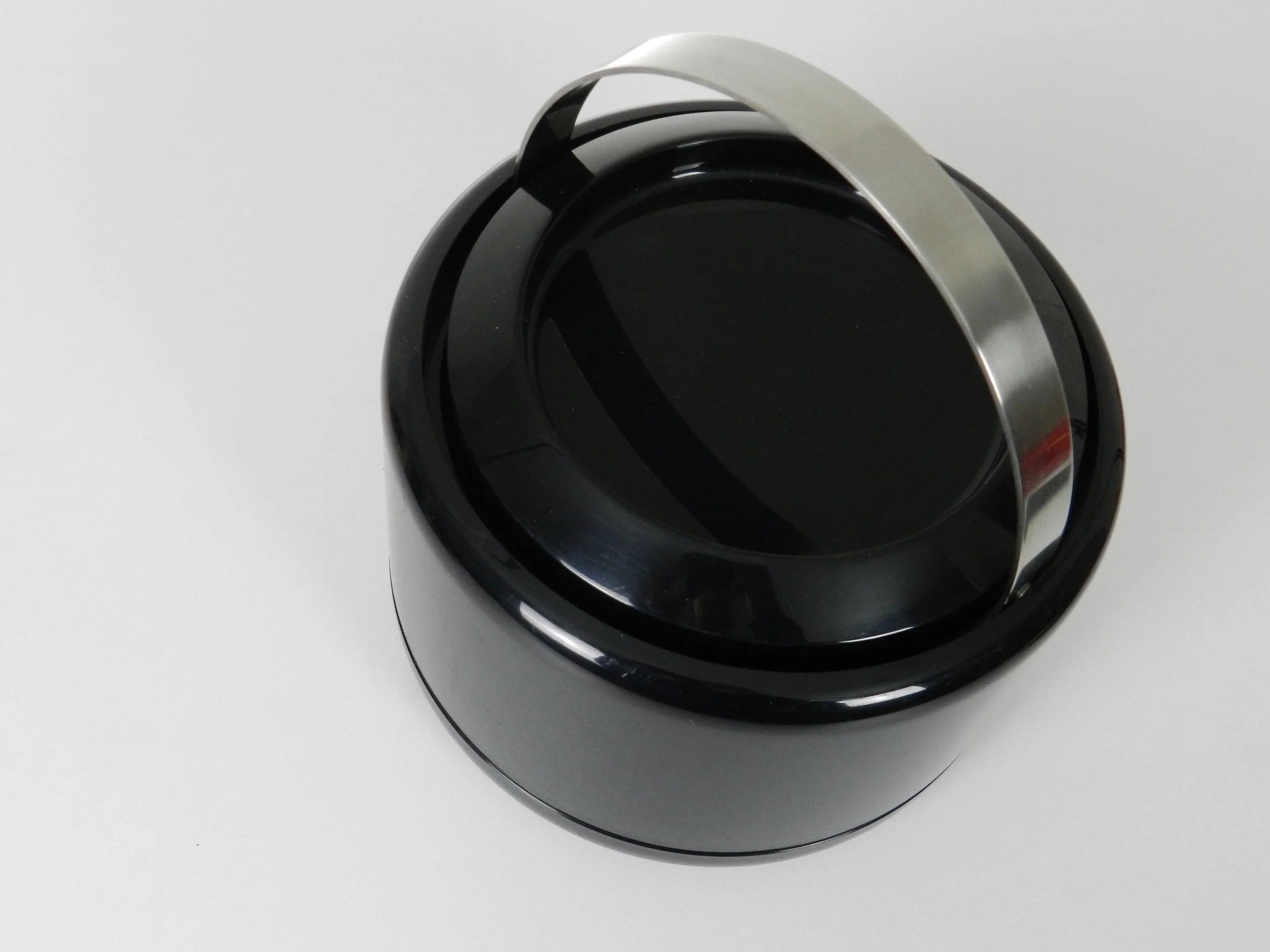 Modernist plastic ice bucket with stainless steel handle designed by Erik Magnussen for Stelton.  Denmark, 1970s.