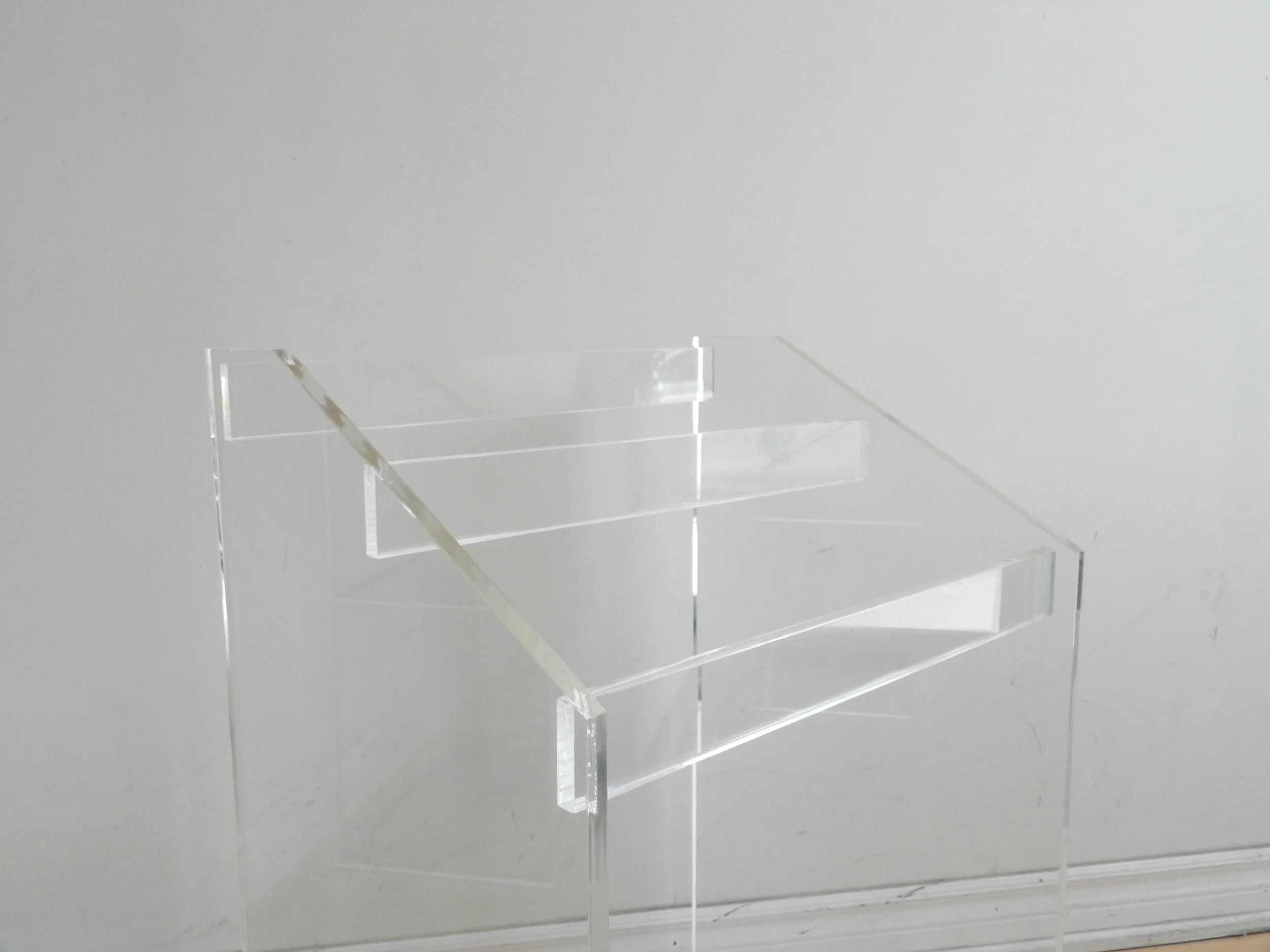 Freestanding towel/blanket rack in lucite.  circa 1980s.