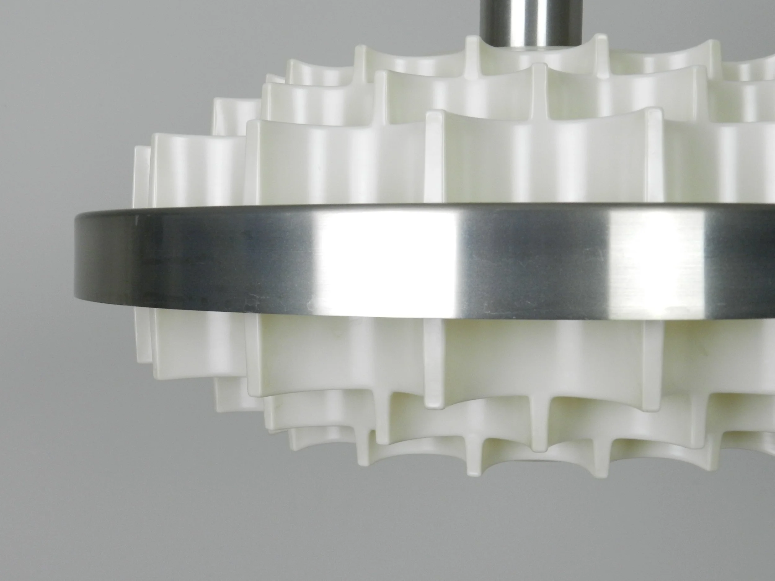 Mid century pendant lamp in plastic and aluminum. Attributed to Lars Schioler for Hoyrup.  Denmark, 1960s.