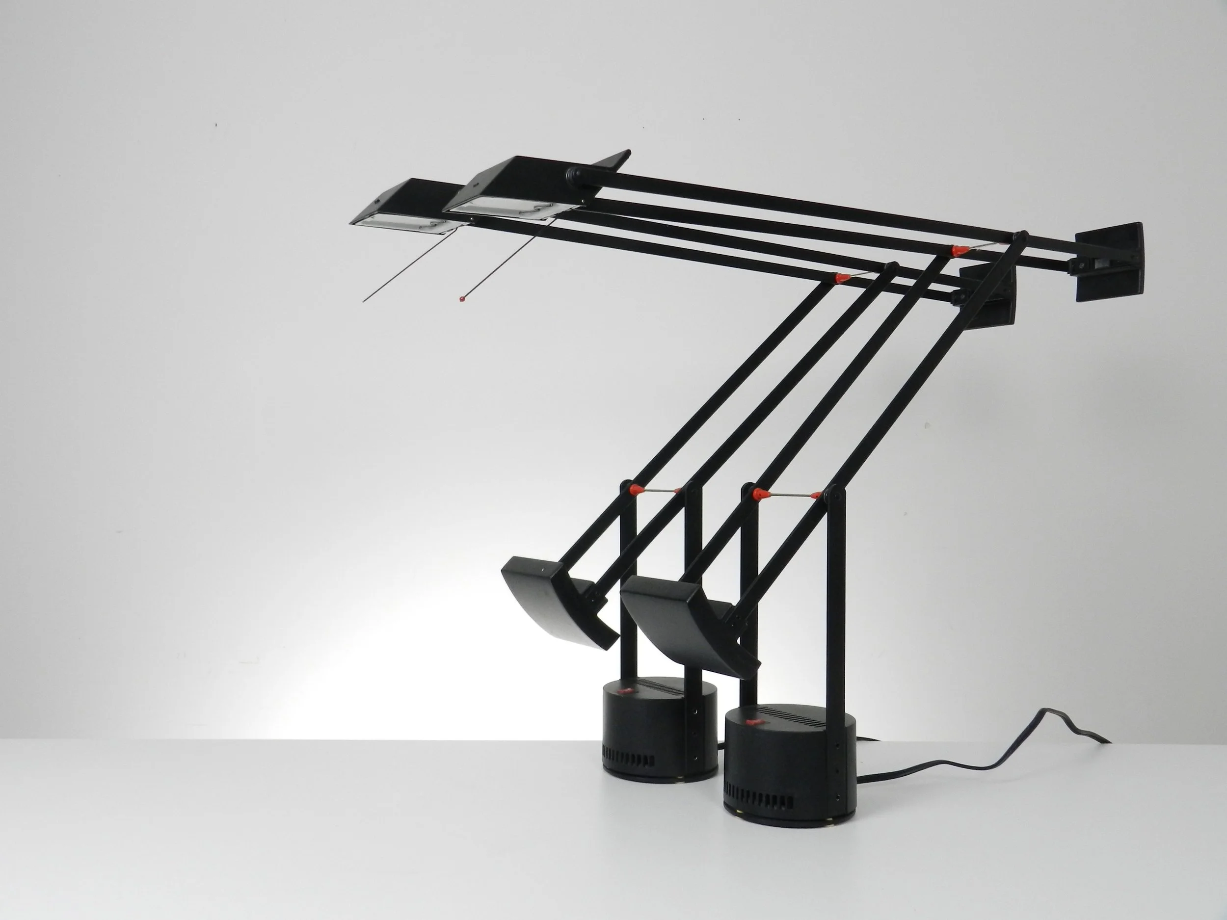 Pair of Tizio lamp designed by Richard Sapper for Artemide.  Italy, 1970s.