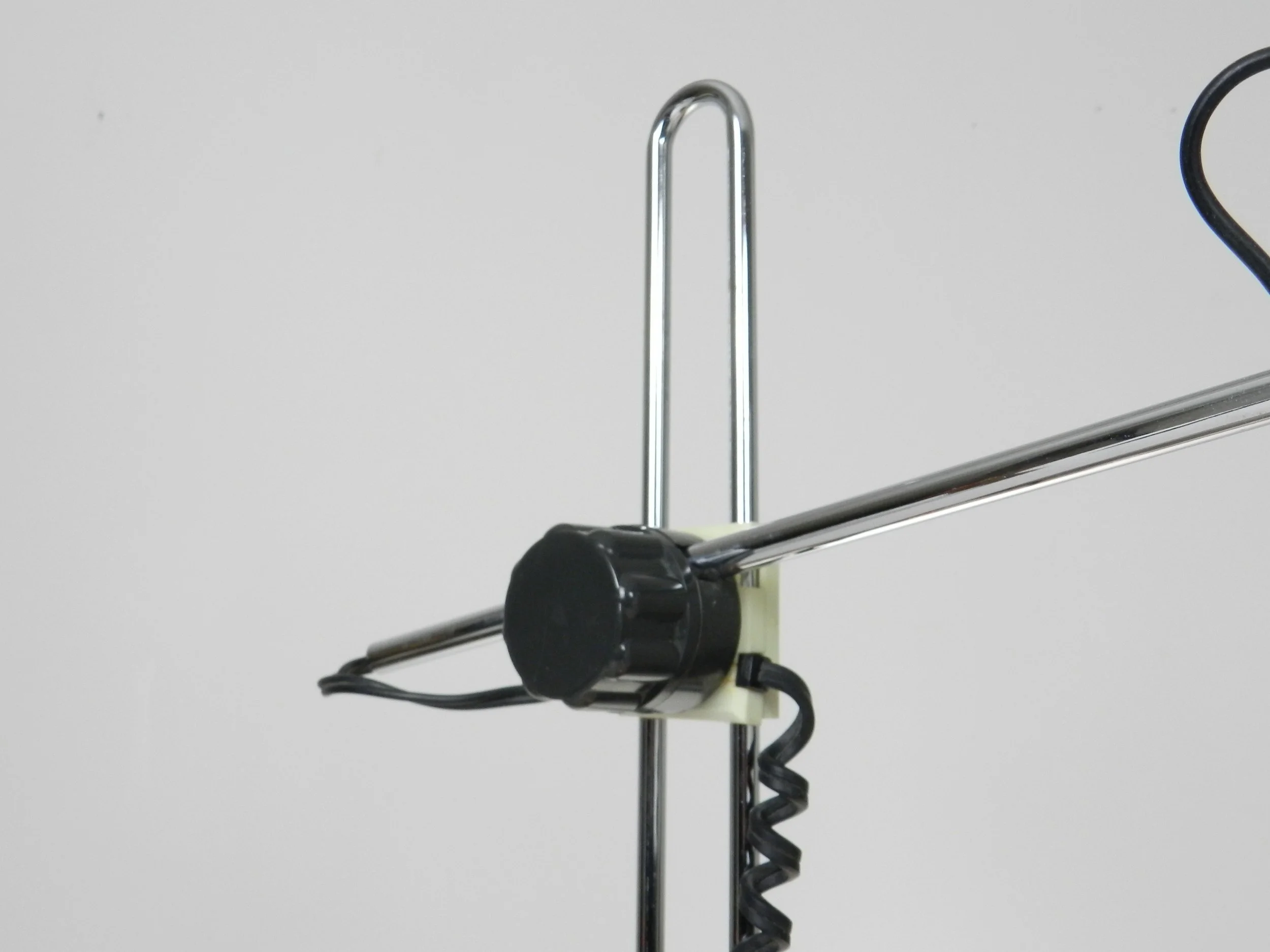 Modernist desk lamp in chrome, plastic and enameled metal by Nanbu.  Japan, 1970s.