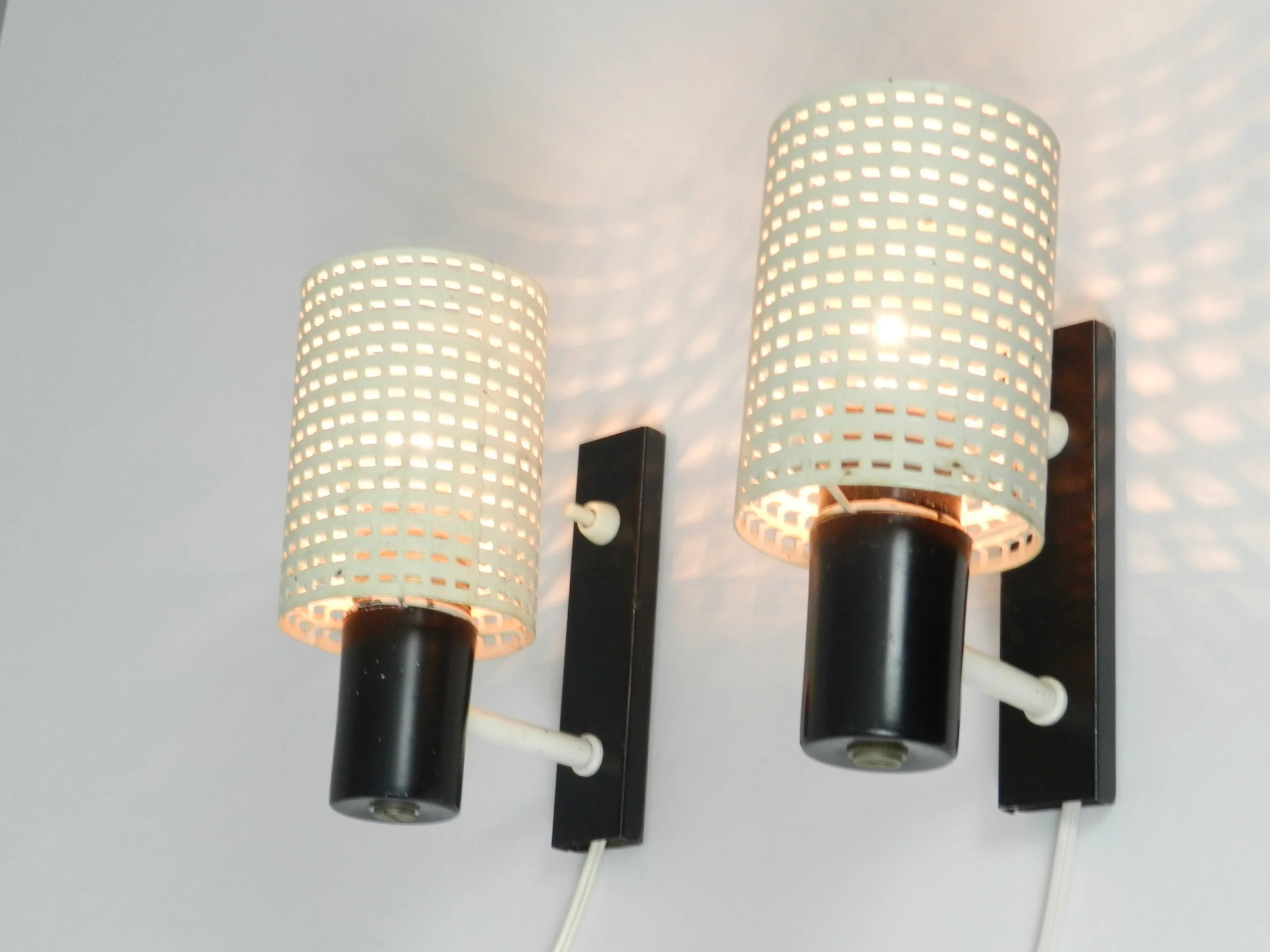 Pair of mid century modern wall lamps by Hala Zeist.  Netherlands, 1960s.