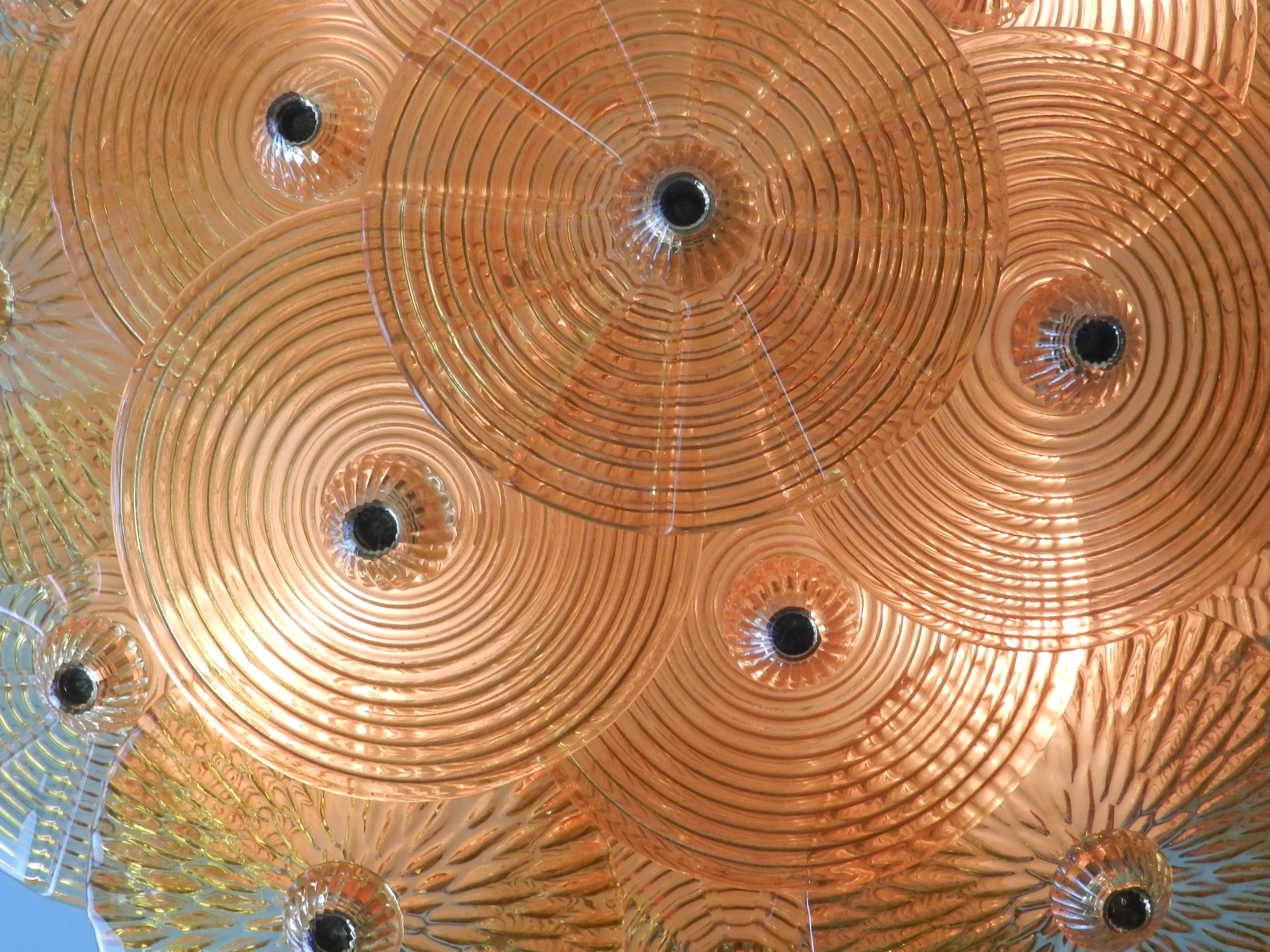 Large murano amber glass disc chandlier from Italy.