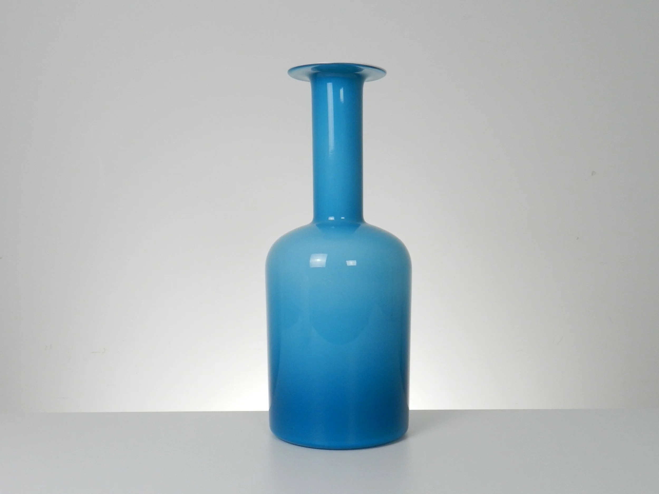 Blue cased glass Gulvase designed by Otto Brauer for Holmegaard.  Denmark, 1960s.