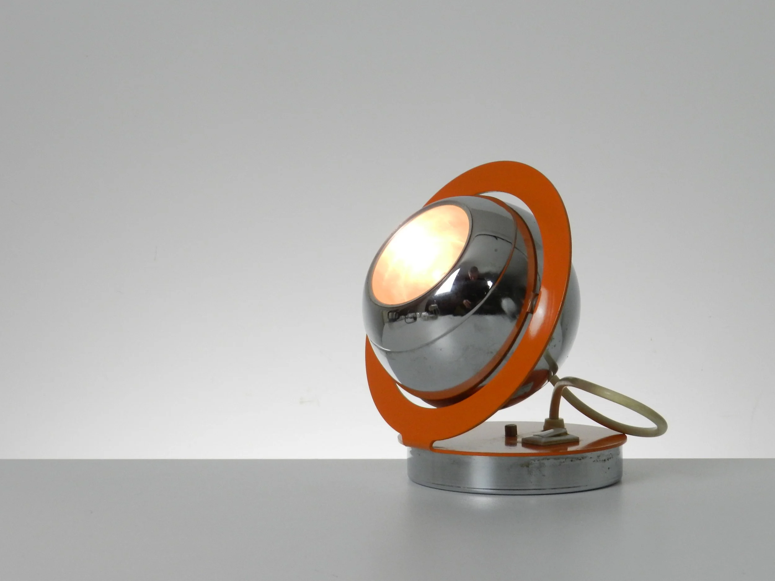 Space age eyeball lamp in enemeled metal and chrome.  Italy, 1970s.
