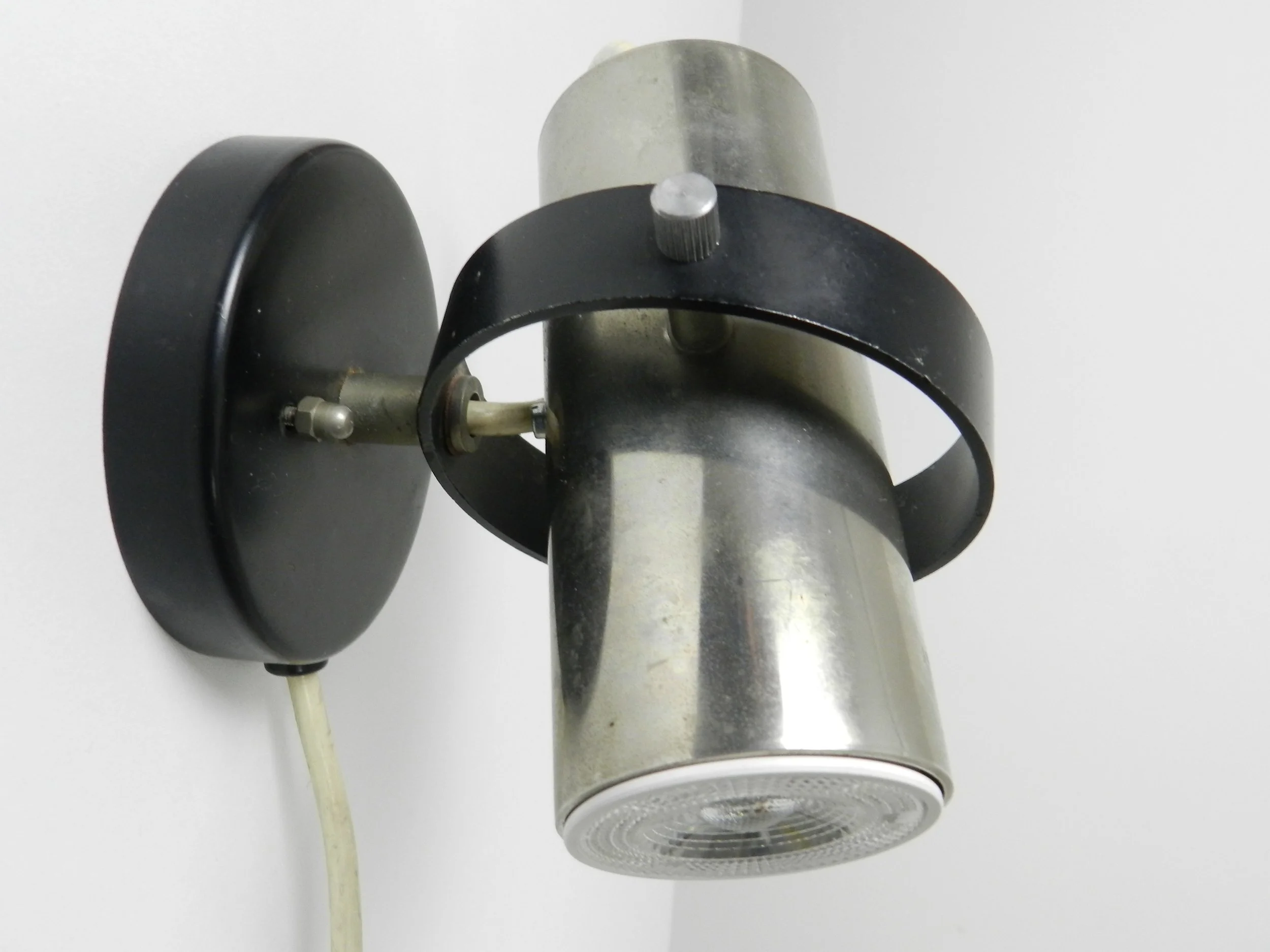 Modernist wall mounted spot lamp by Raak.  Netherlands, 1960s.