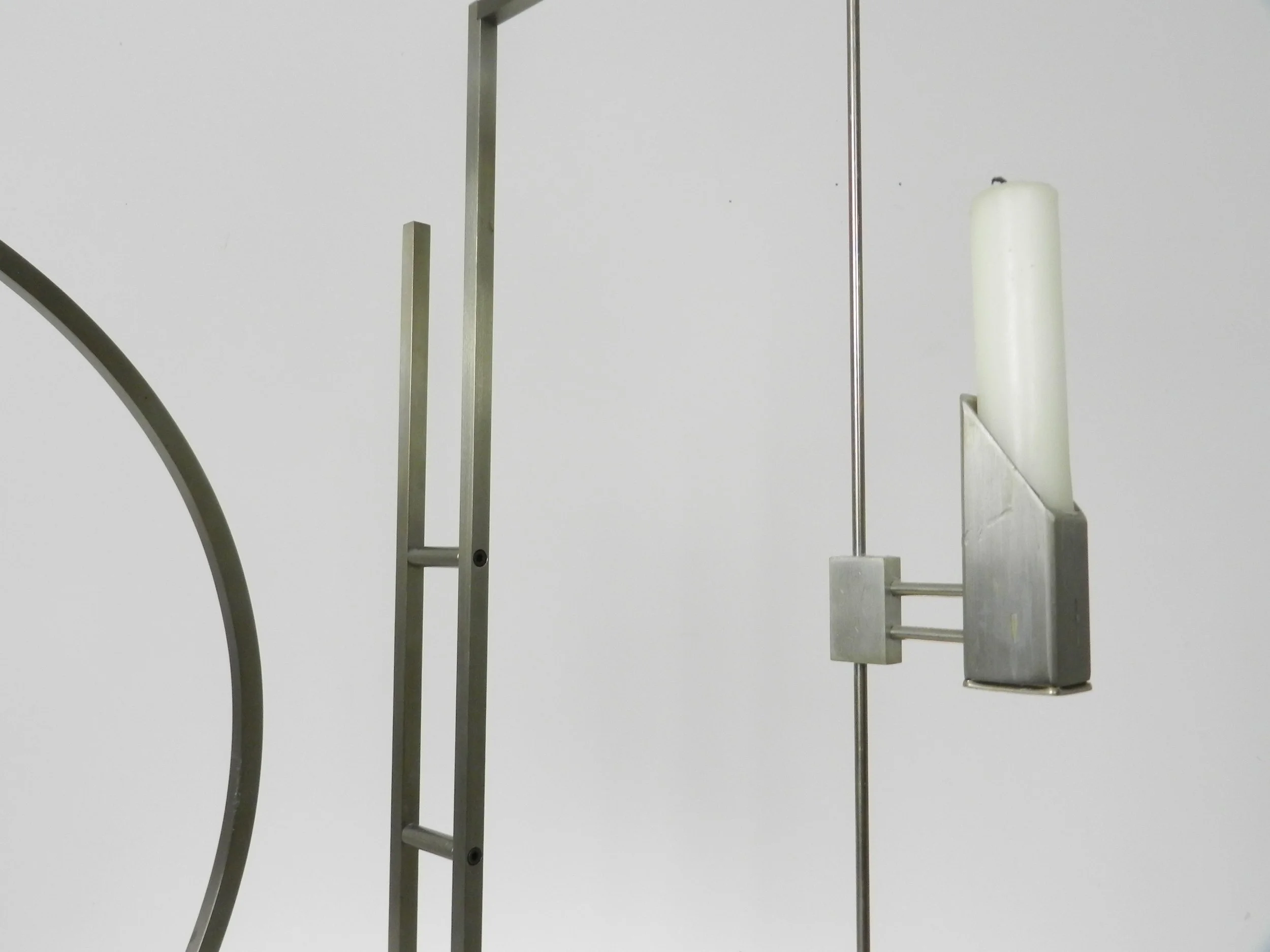 Pair of modernist stainless steel candle holders designed by David Zelman for Prologue 2000.  USA, 1980s.
