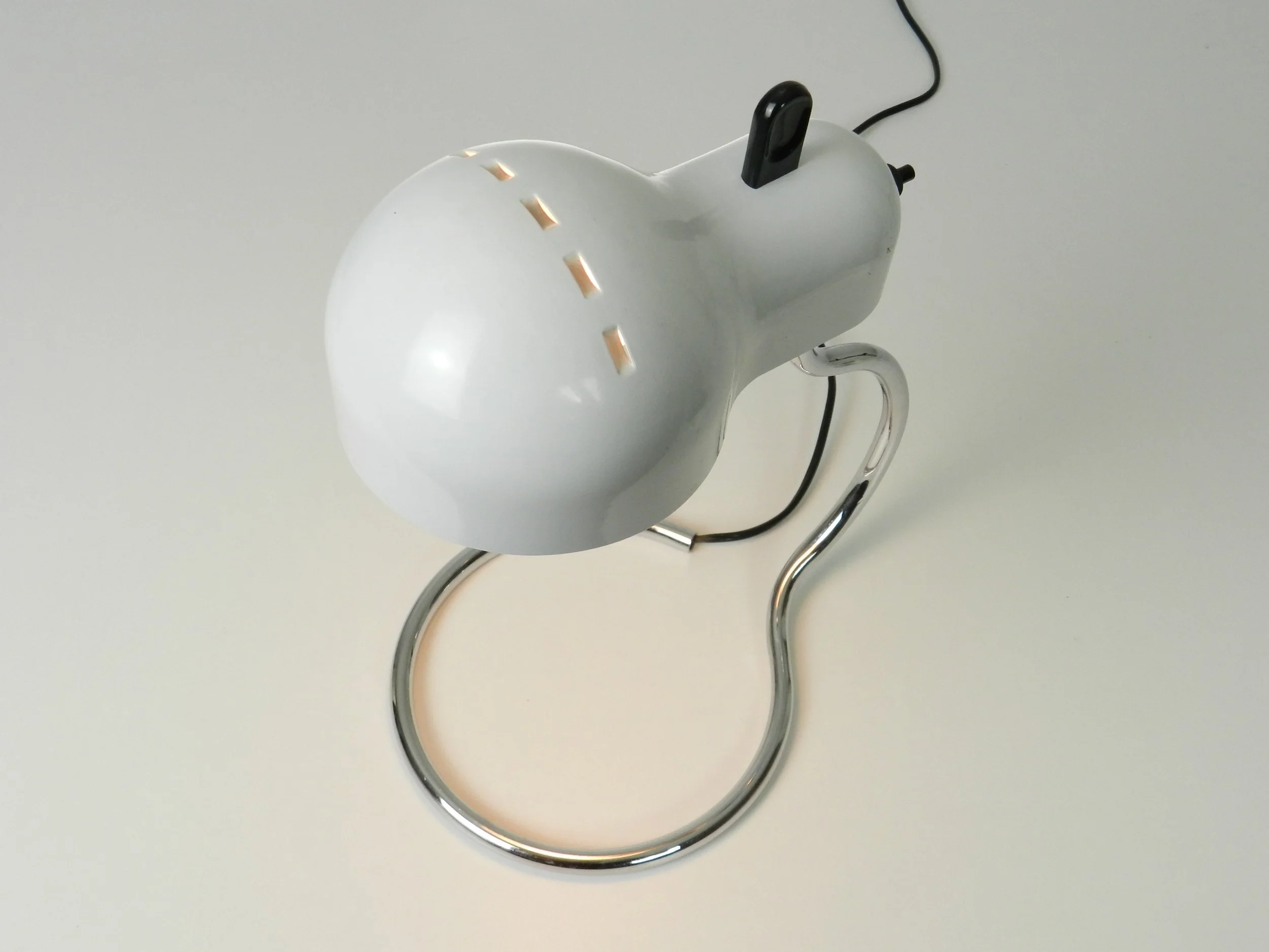 Minitopo table lamp designed by Joe Colombo for Stilnovo.  Italy, 1970s.