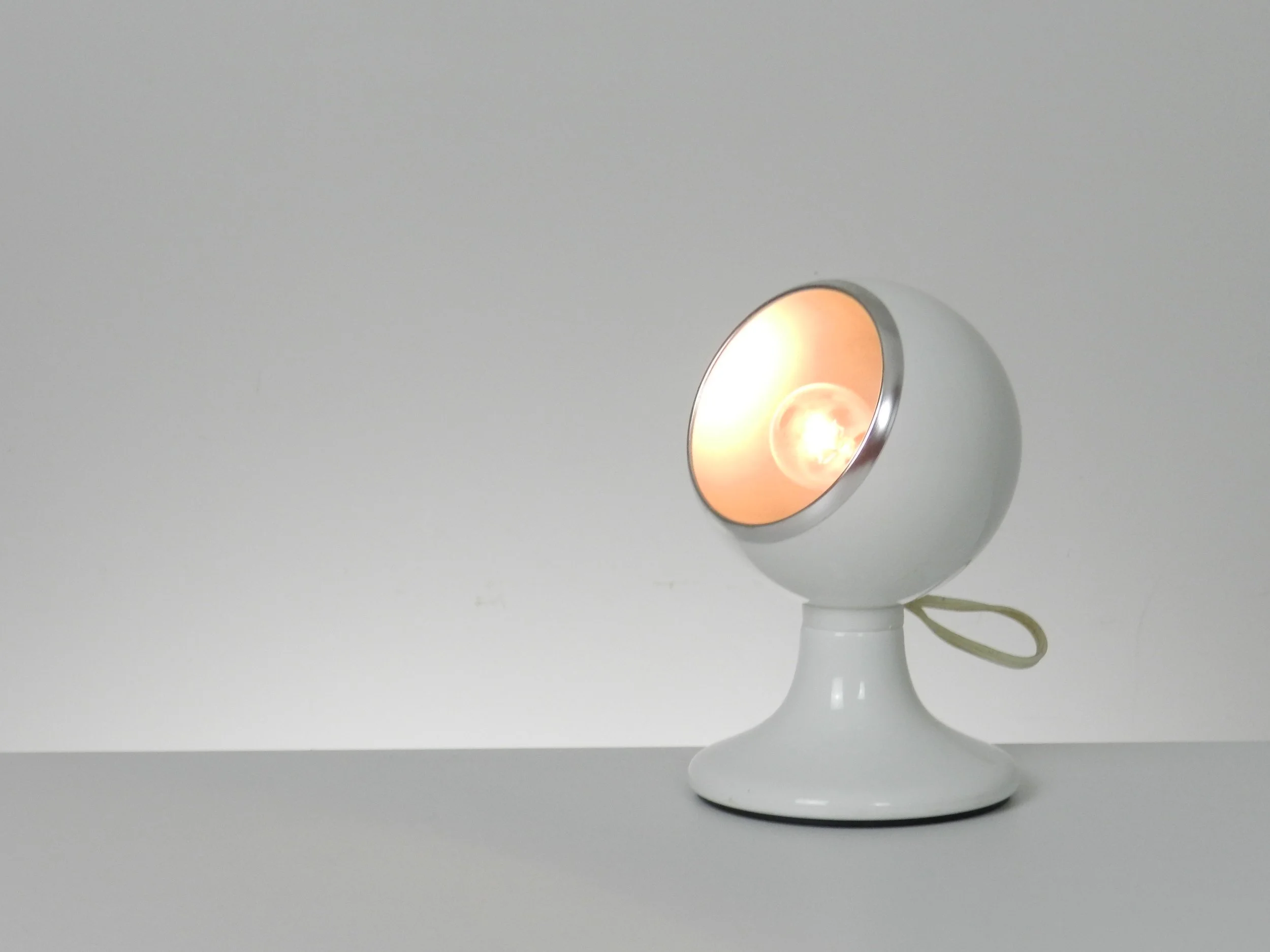 Magnetic eyeball table or wall lamp by Luci Illuminazione Di Interni.  Italy, 1970s.