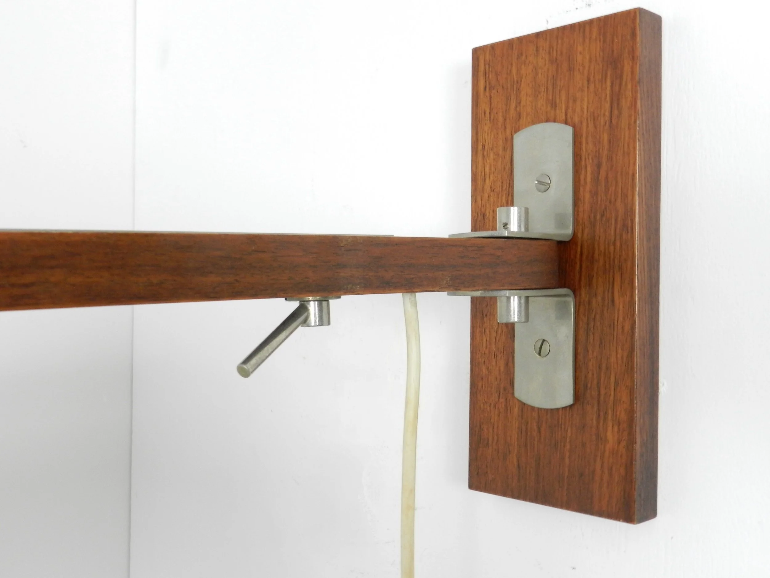 Mid century extendable wall lamp in rosewood and chrome with original shade.  Denmark, 1960s.