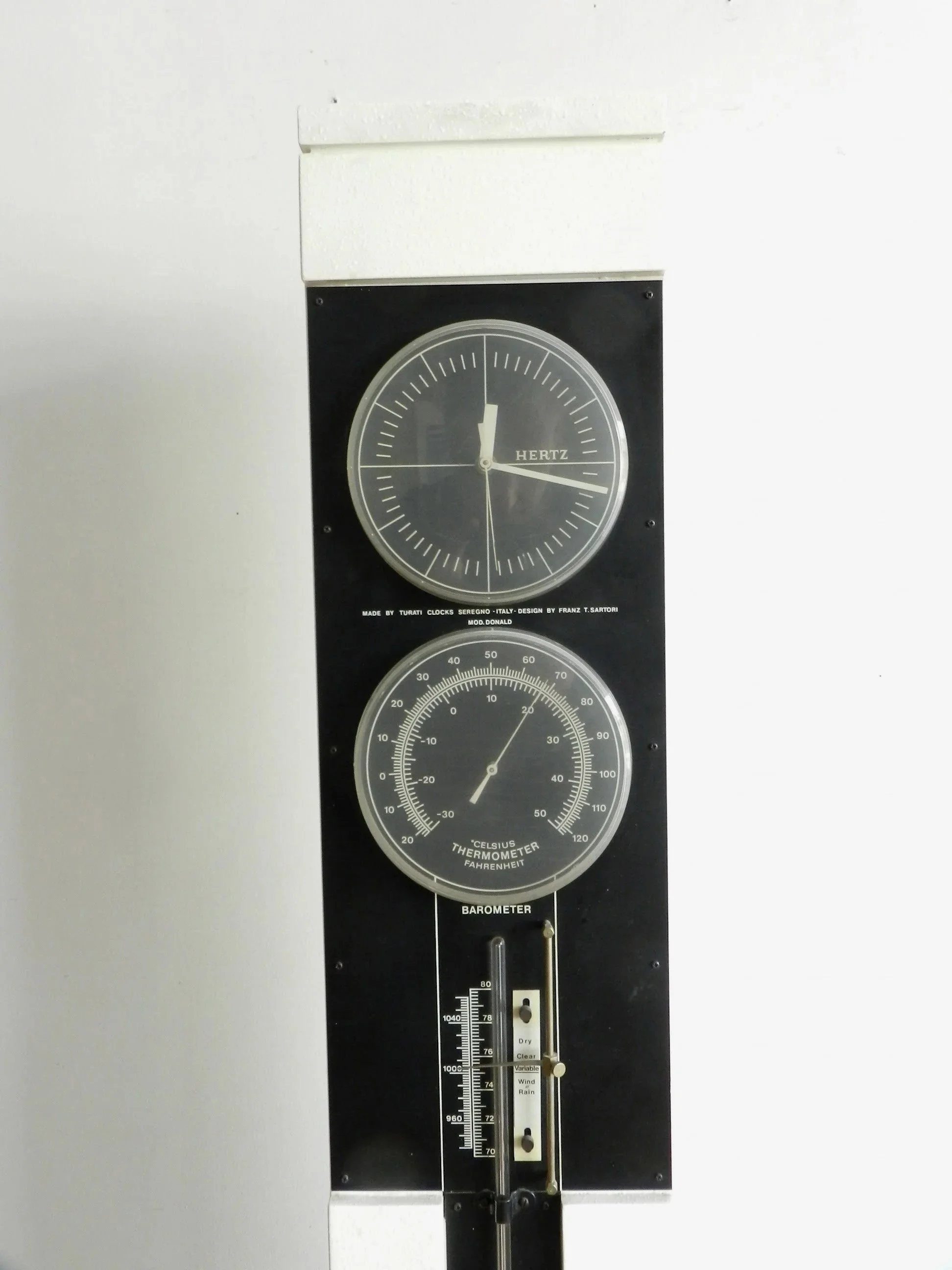 Modernist floor clock, thermometer and barometer designed by Franz T. Sartori for Turati.  Italy, 1960s.