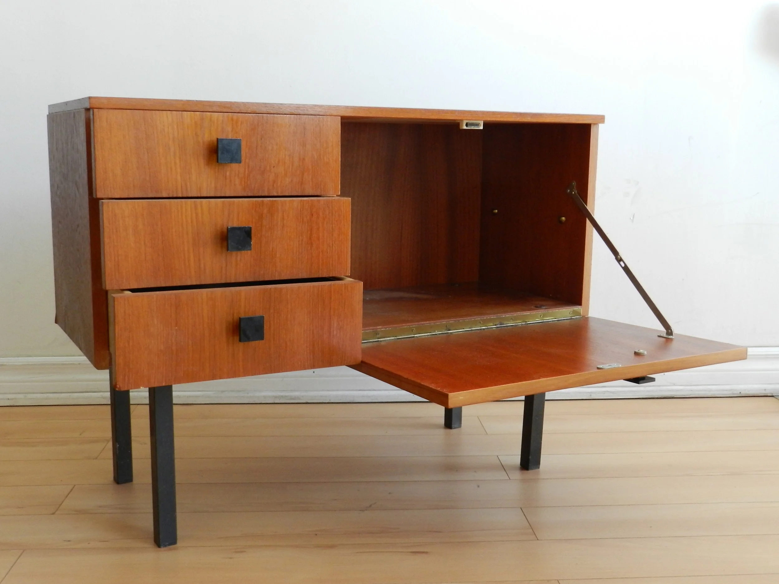Teak entry or bar cabinet with metel legs and hardware.  Scandinavia, 1970s.