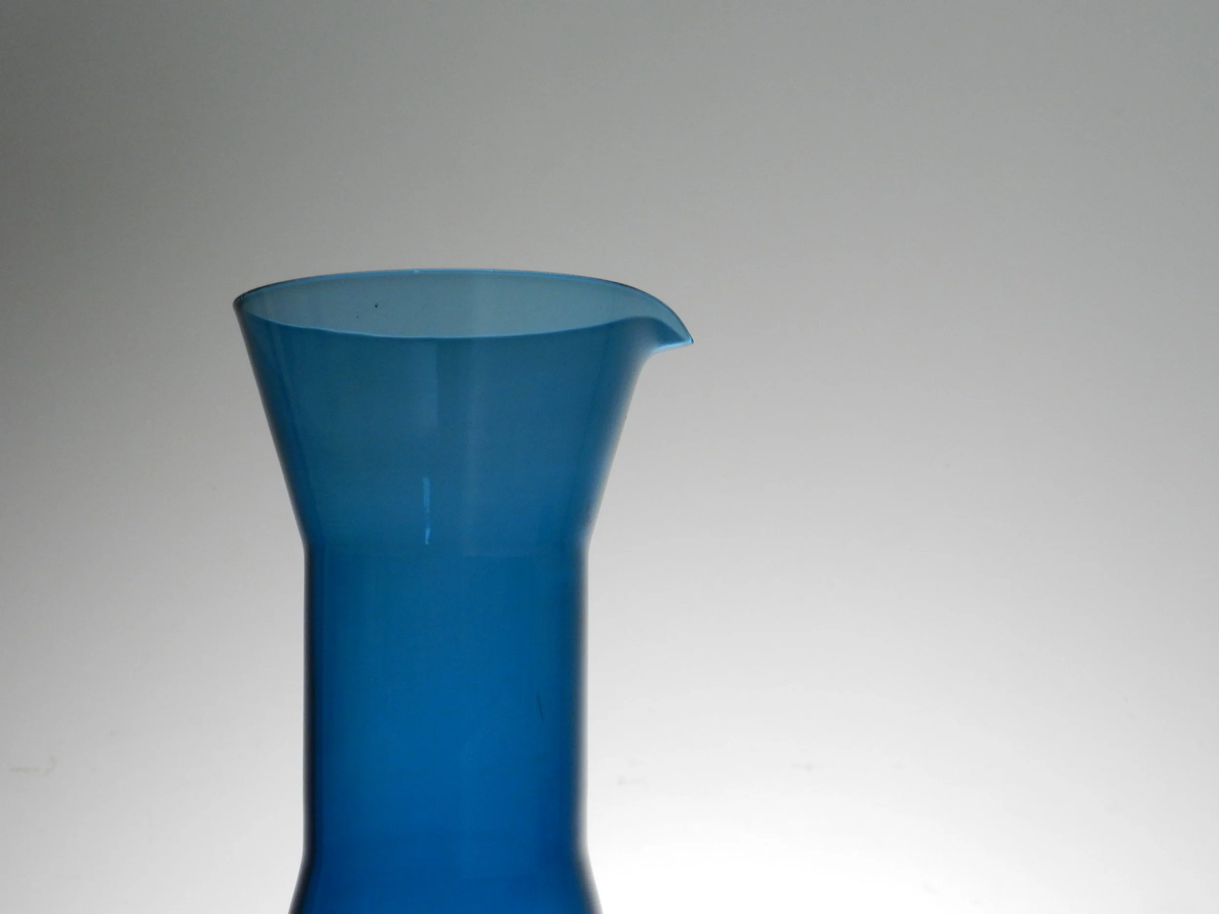 Mid century Scandinavian glass decanter and 3 glasses.  circa 1960s.