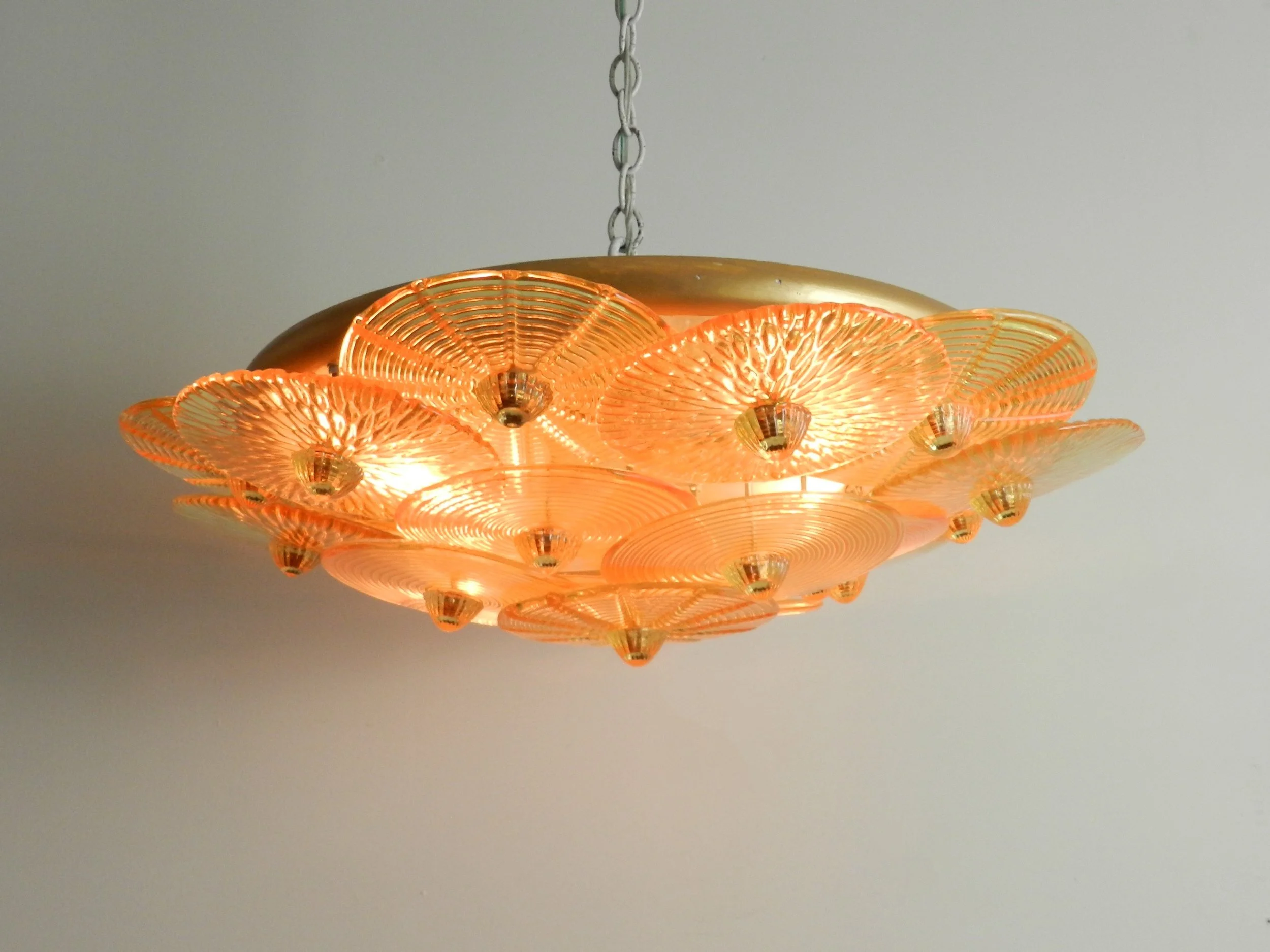 Large murano amber glass disc chandlier from Italy.