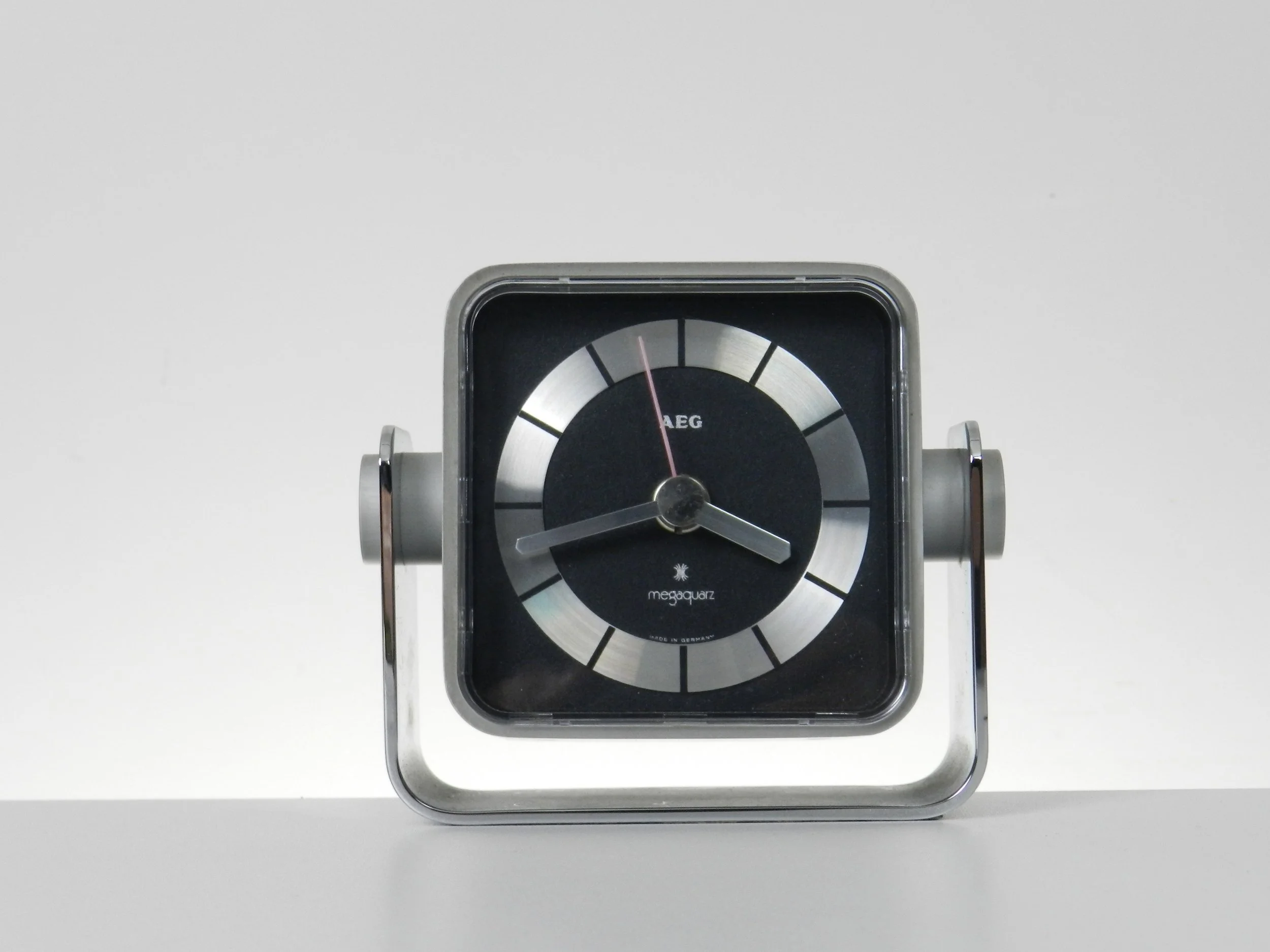 Modernist clock with steel case by AEG.  Germany, 1960s.