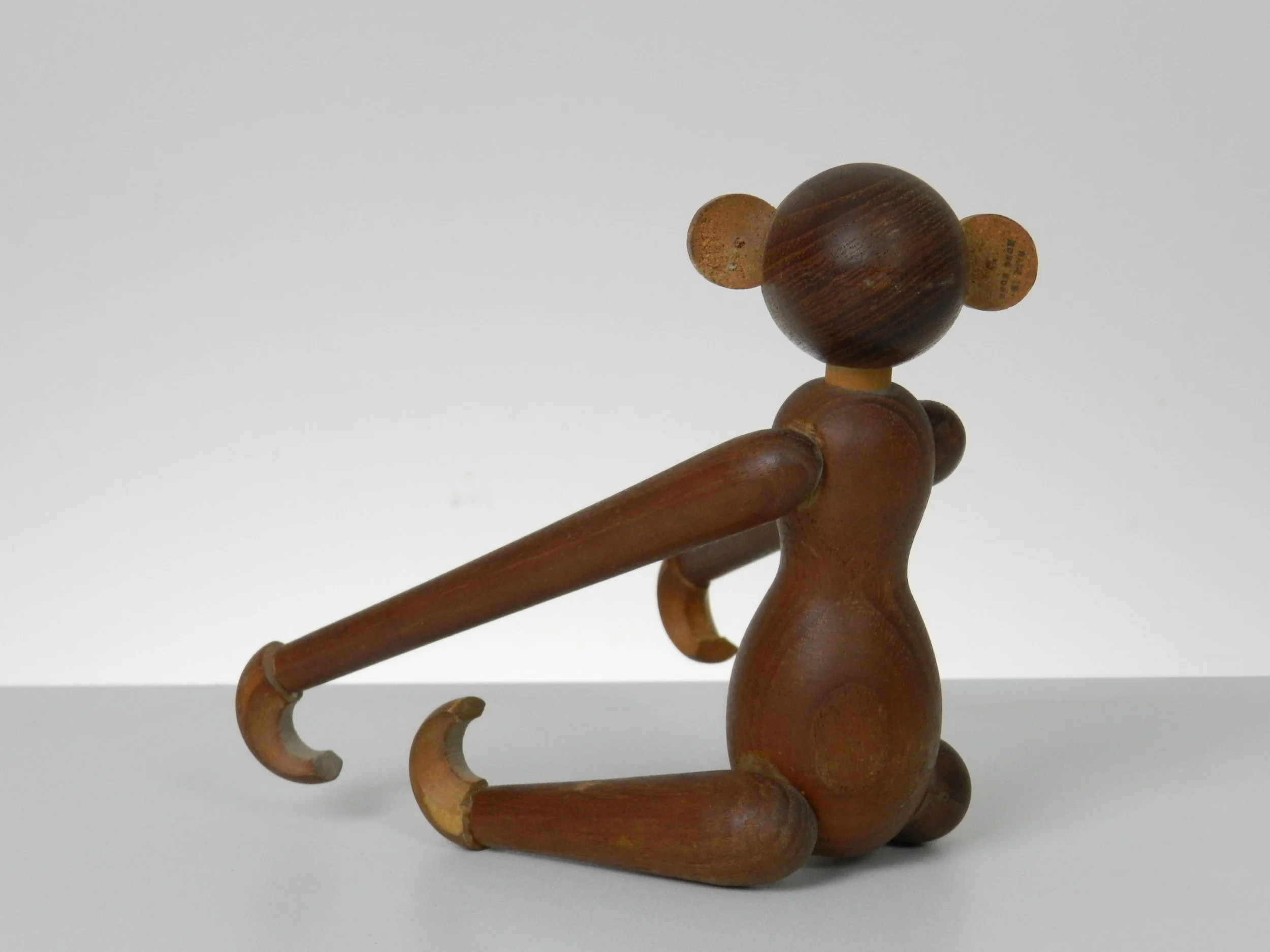 Vintage teak monkey in the style of Kay Bojesen.  circa 1960s.