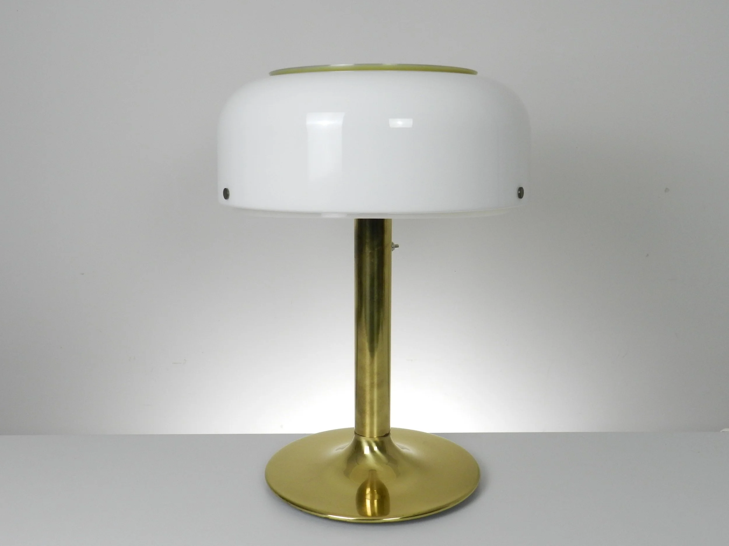 Modernist Knubbling table lamp in brass with plastic shade. Designed by Anders Pehrson for Atelje Lyktan.  Sweden, 1970s.
