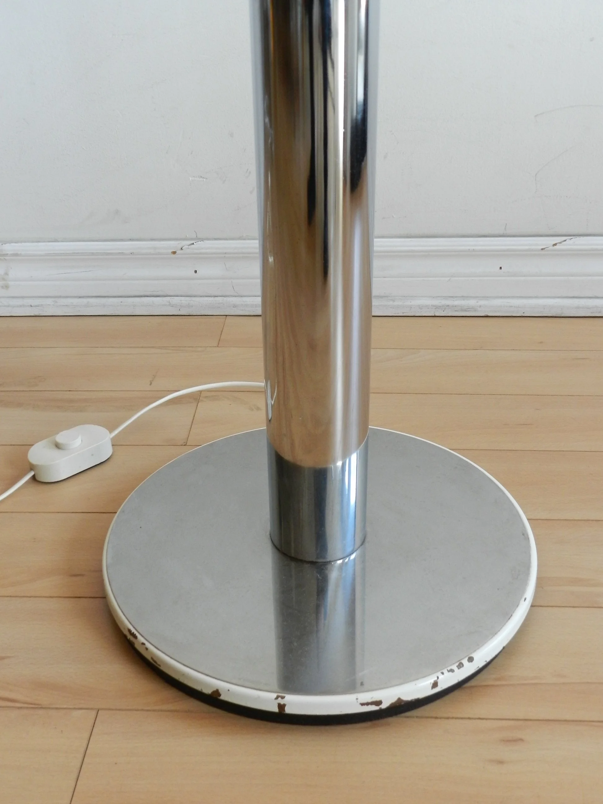 Monumental floor lamp designed by Goffredo Reggiani. Chromed steel with plastic shade.  Italy, 1970s.