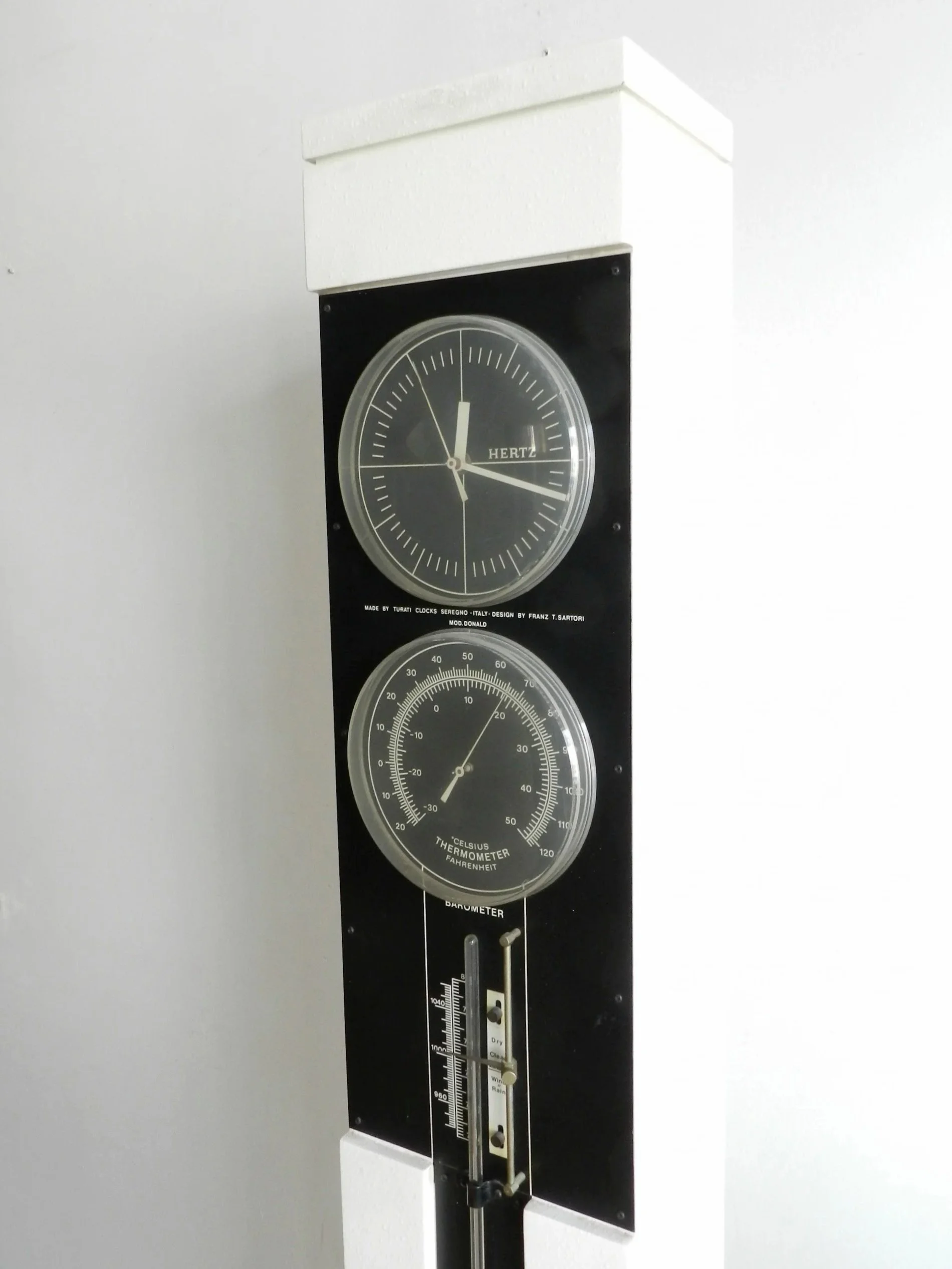 Modernist floor clock, thermometer and barometer designed by Franz T. Sartori for Turati.  Italy, 1960s.