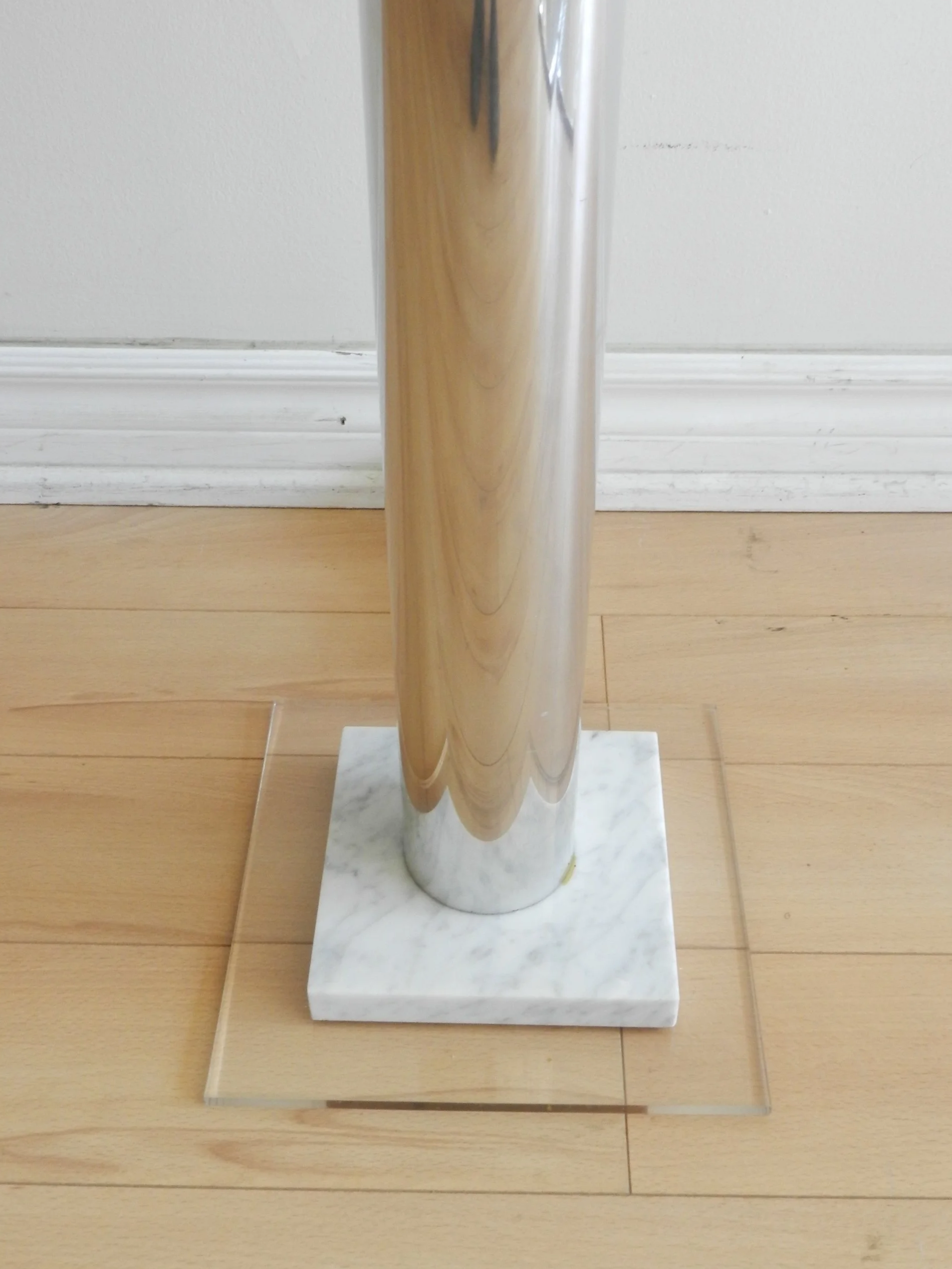 Modernist floor lamp designed by Gustavo Martinez for Origina. Polished aluminum, plastic shade on marble and acrylic.  Canada, 1970s.