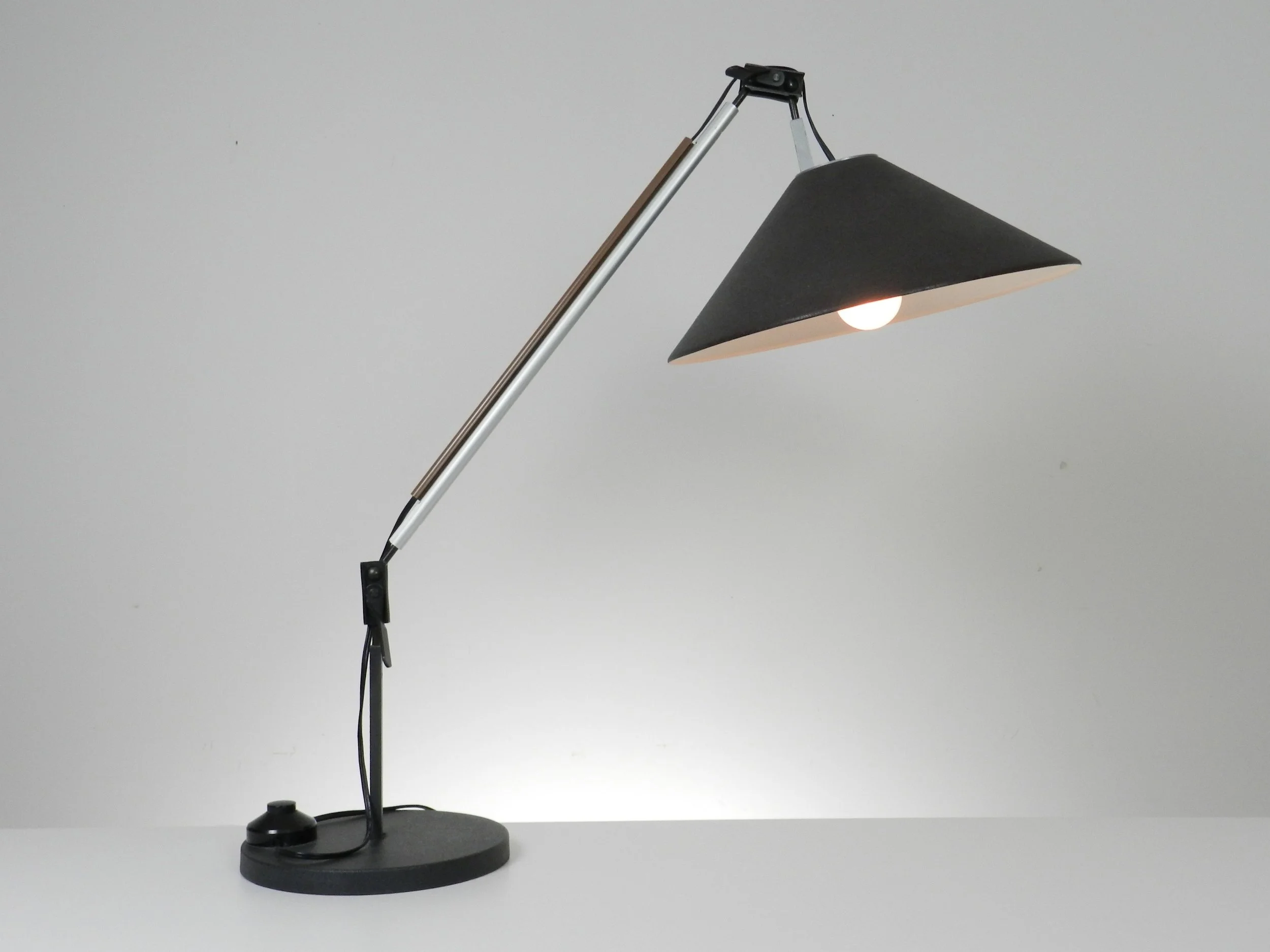 Aggregato adjustable lamp designed by Enzo Mari and Giancarlo Fassina for Artemide.  Italy, 1970s.
