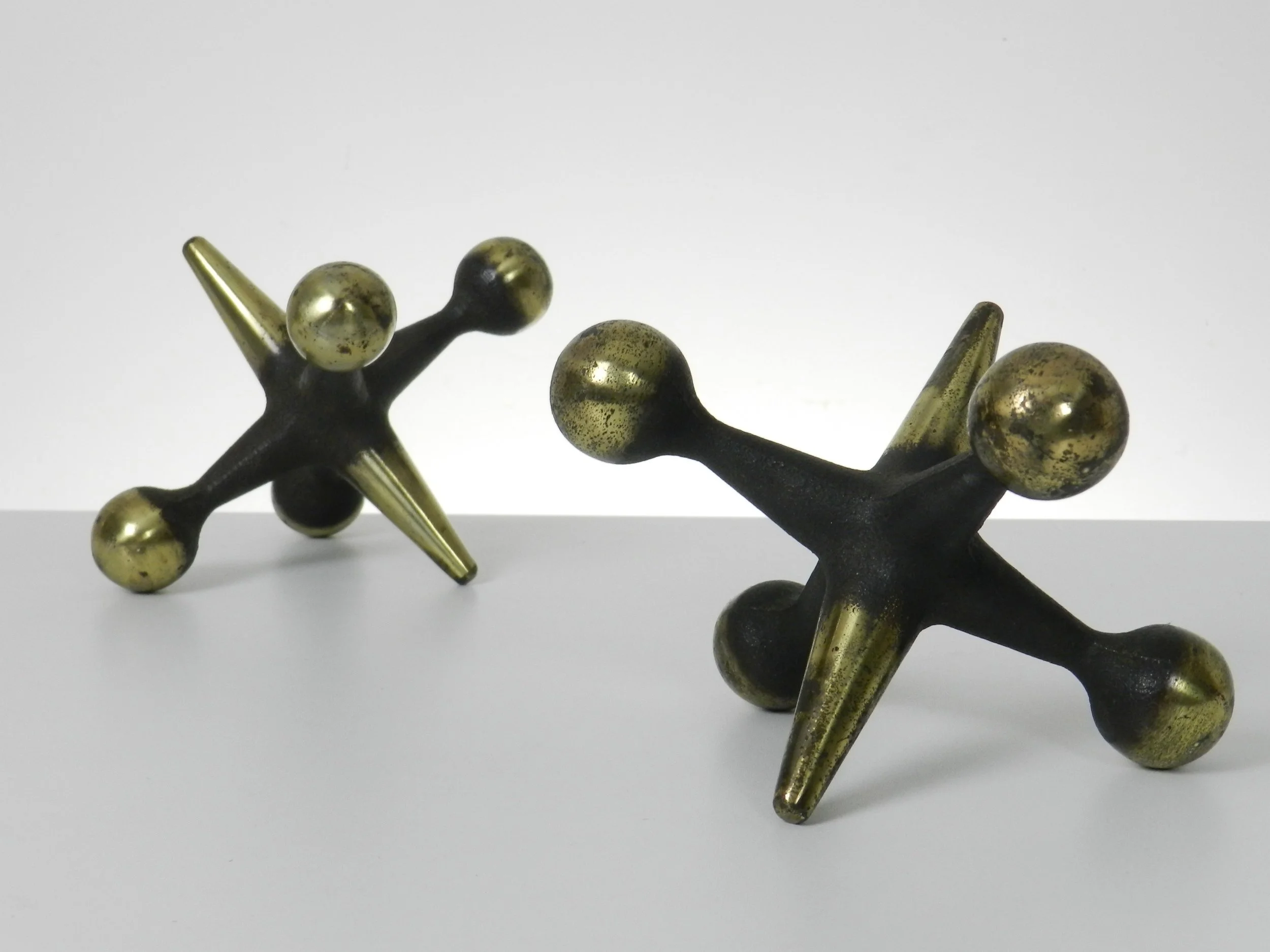 Pair of mid century cast iron bookends designed by Bill Curry for Design Line.  circa 1960s.