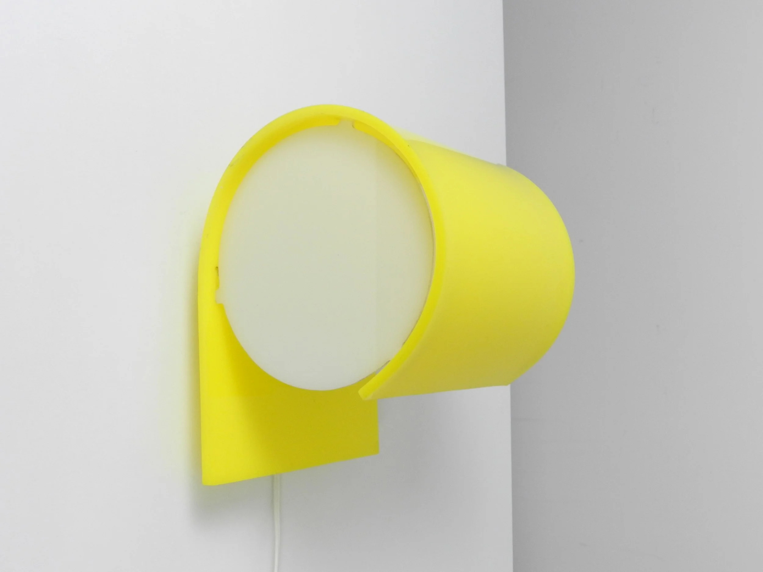 Space age Glo-Up acrylic wall sconce designed by Douglas Ball and John Berezowsky for Danesco.  Canada, 1970s.