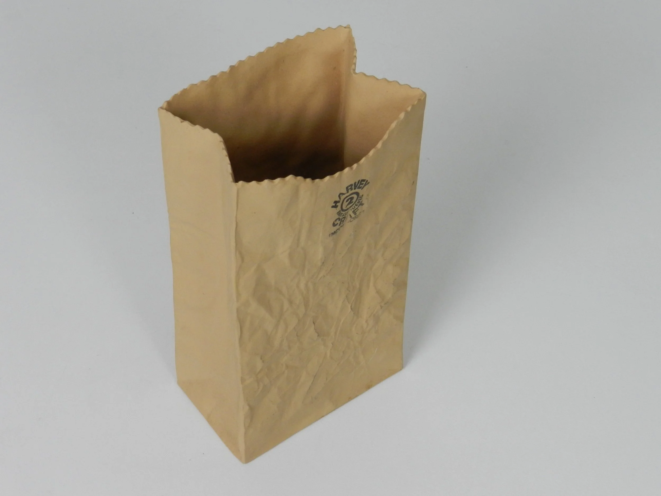 Ceramic paper bag vase designed by Michael Harvey.  Canada, 1980s.
