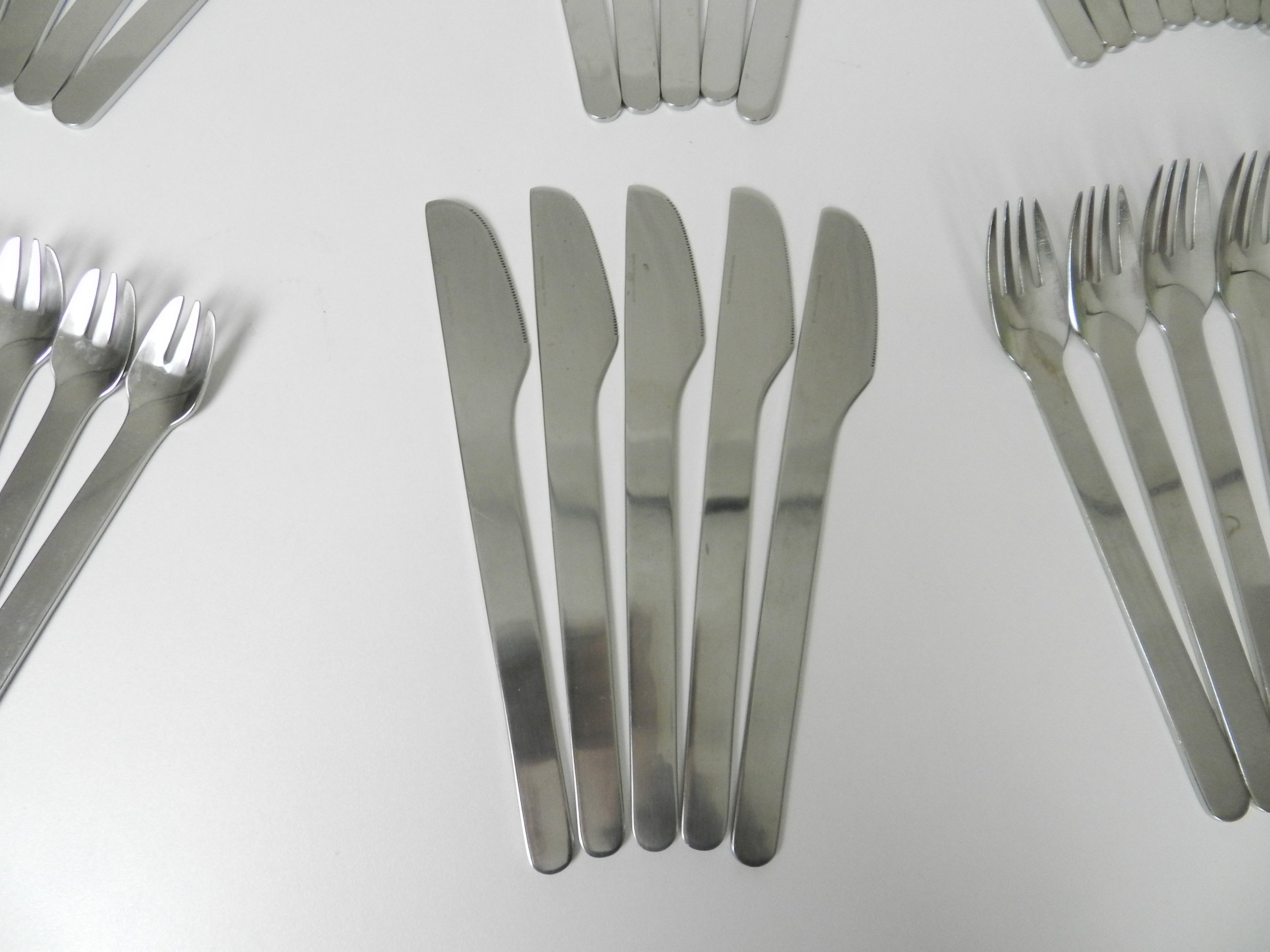 Stainless steel flatware designed by Louise Campbell for Georg Jensen, Denmark.