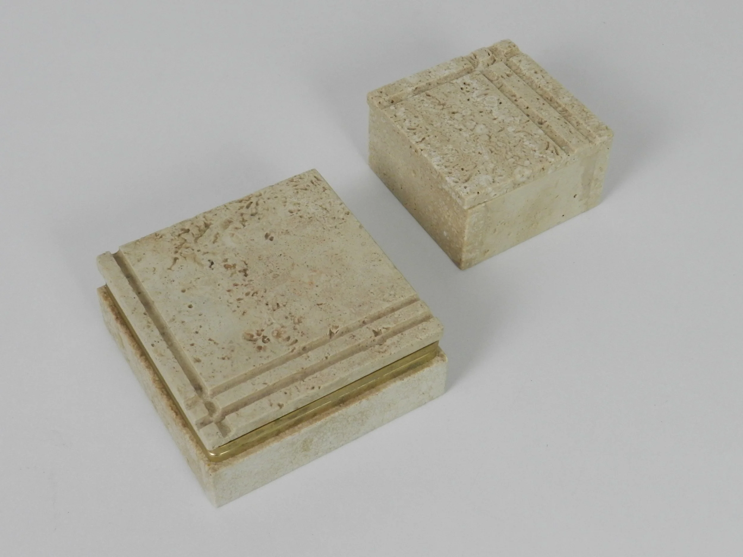 Pair of travertine boxes in the style of Fratelli Mannelli.  Italy, 1970s.