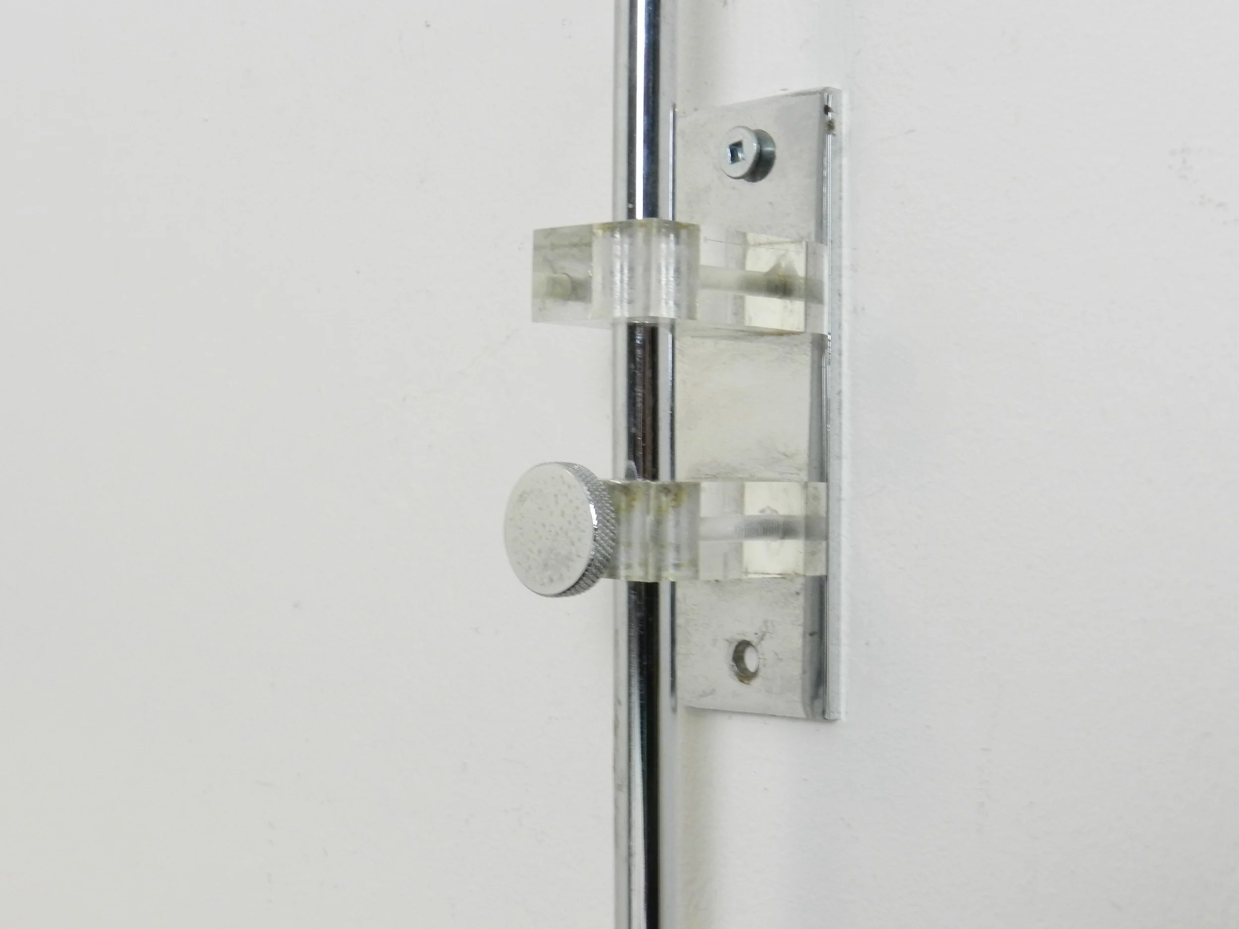 Chrome space age arc wall lamp by Gepo.  Netherlands, 1970s.