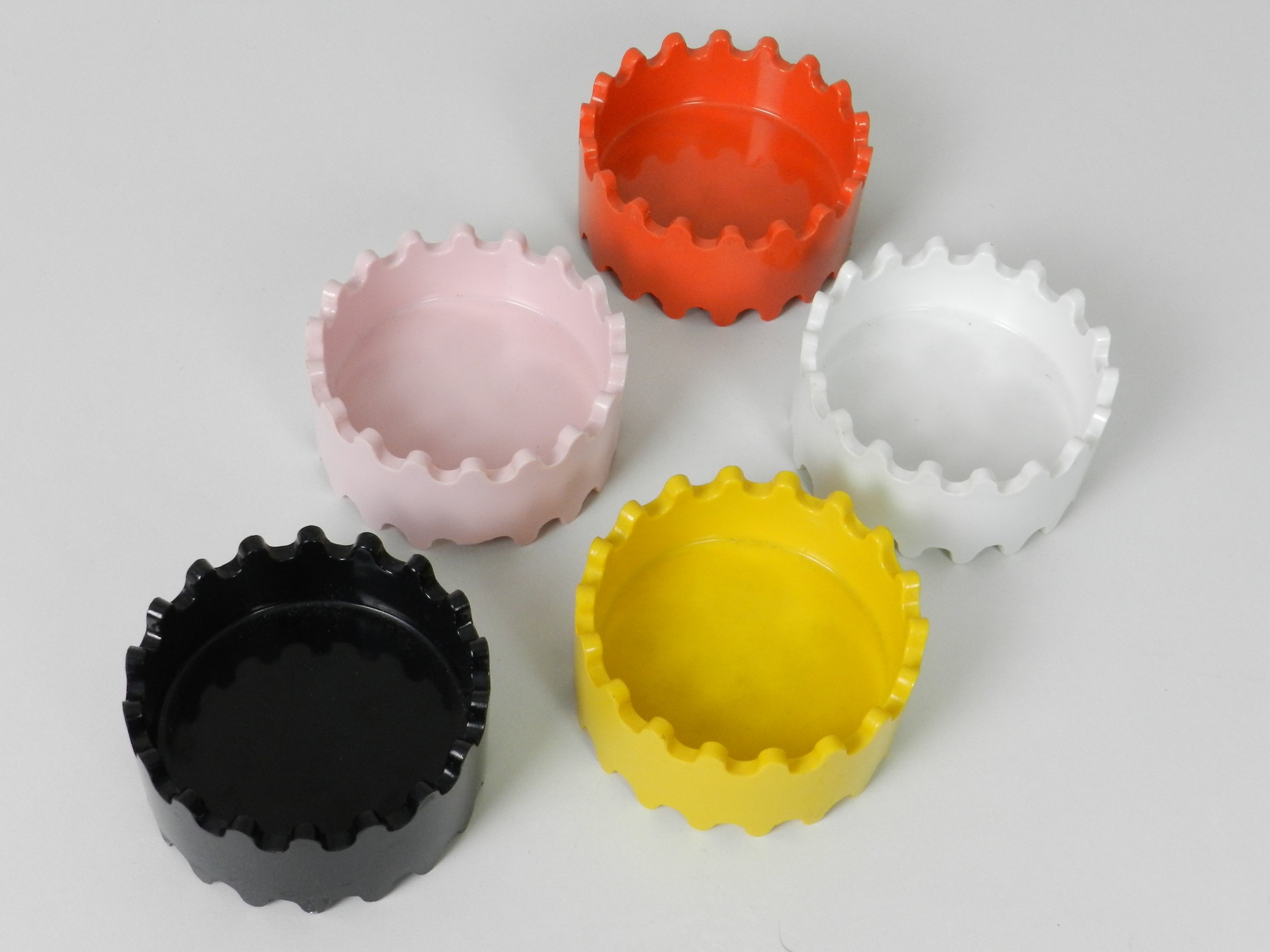 Set of 5 Stax ashtrays in melamine designed by Alan Fletcher.  circa 1970s.