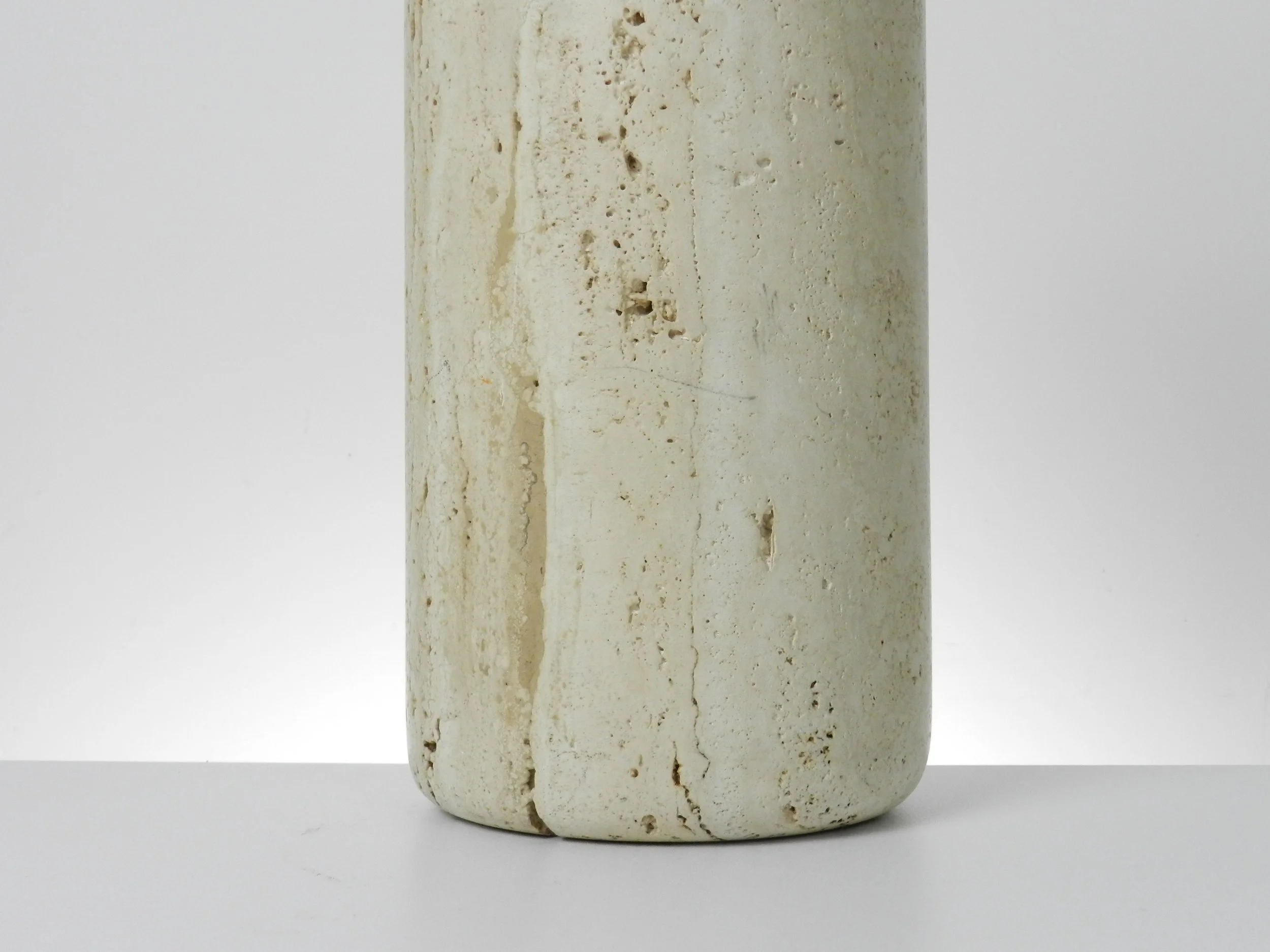 Tall travertine dry vase by Raymor.  Italy, 1970s.