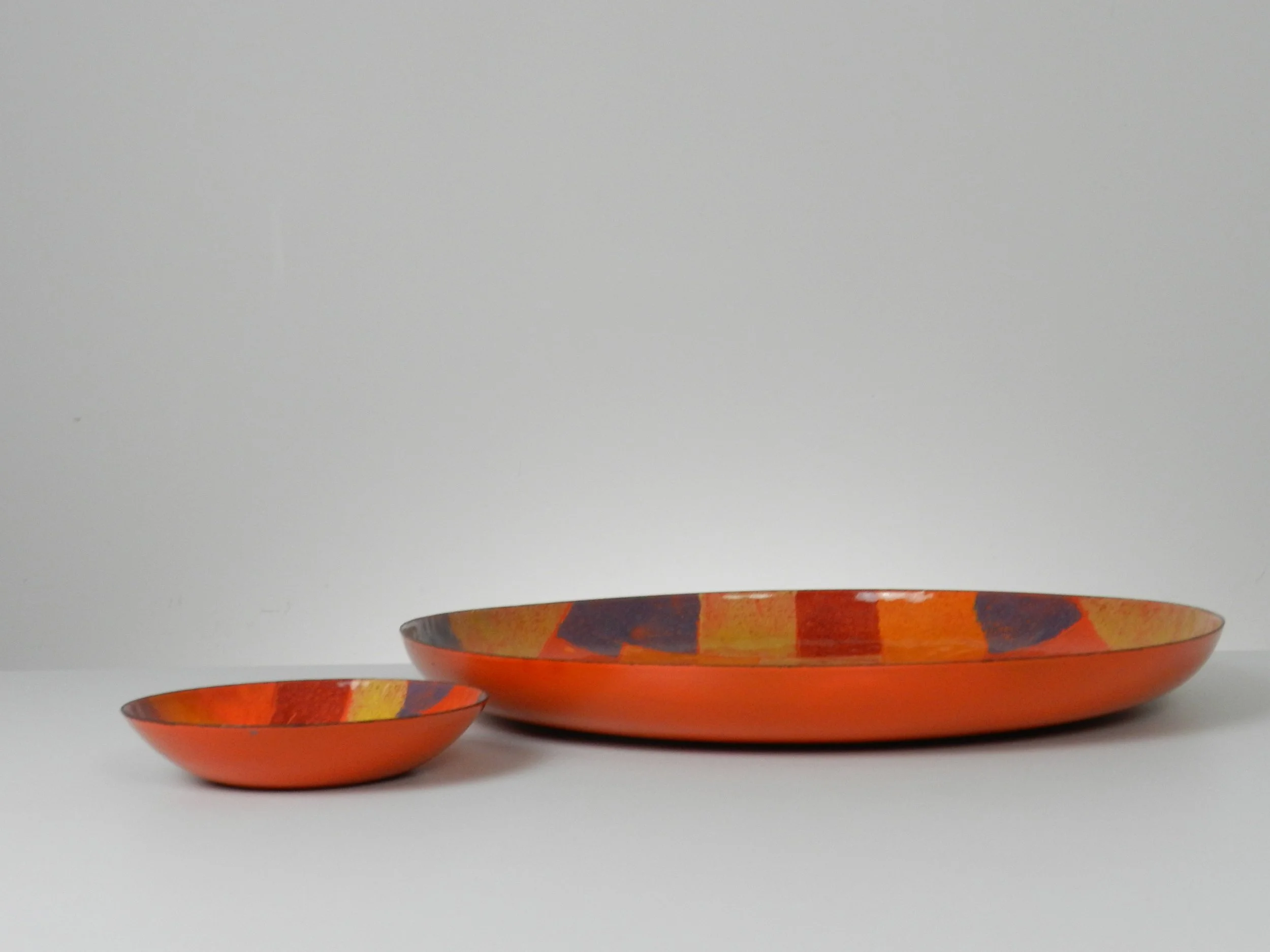 Extra large patchwork  modernist enamel bowl with smaller matching bowl. Designer unknown, probably of Italian origin.  Italy, 1970s.