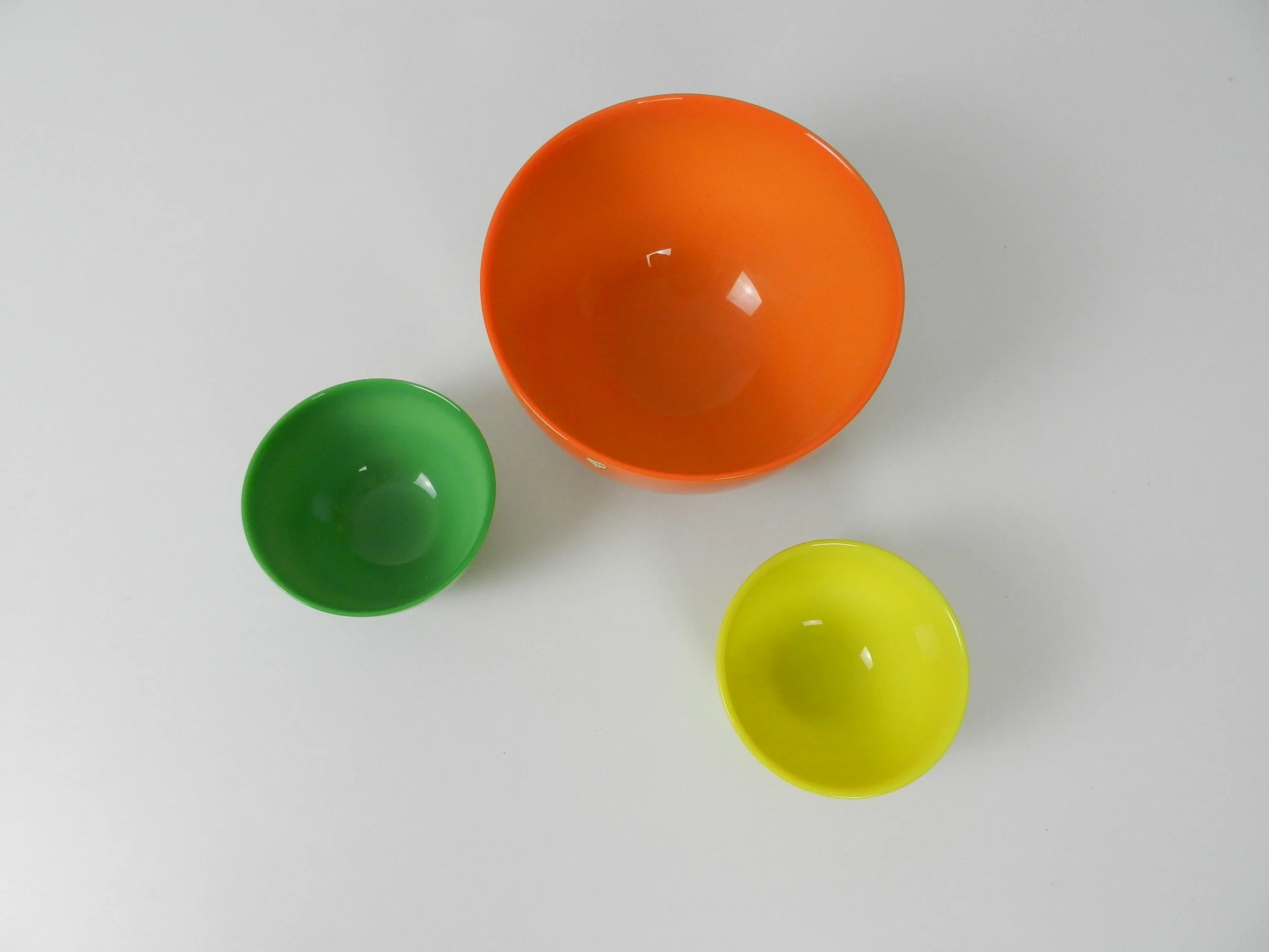 Set of 3 glass “Colora” bowls designed by Sven Palmqvist for Orrefors.  Sweden, 1960s.