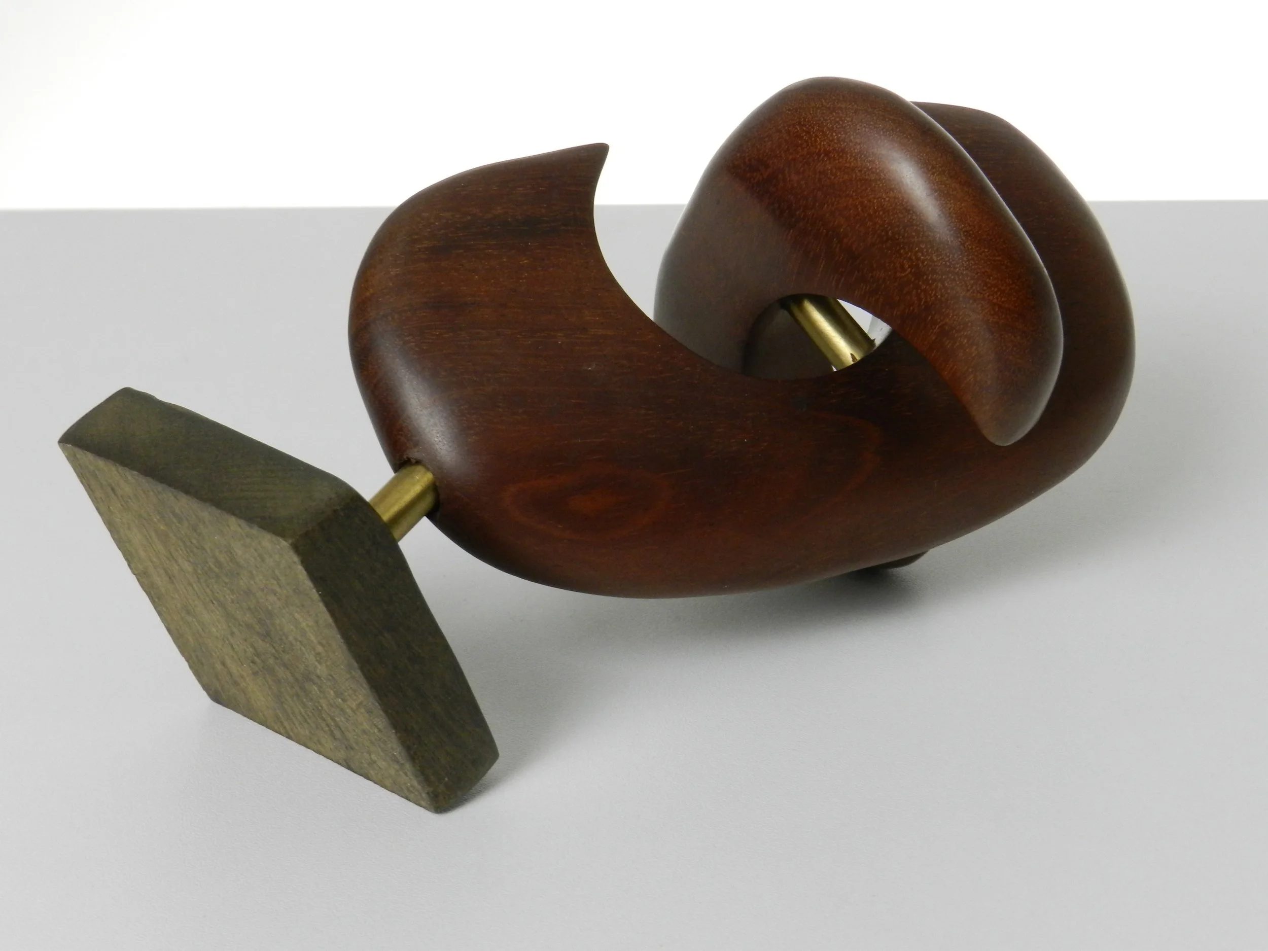 Modernist small sculpture in teak and brass, artist unknown.  circa 1960s.