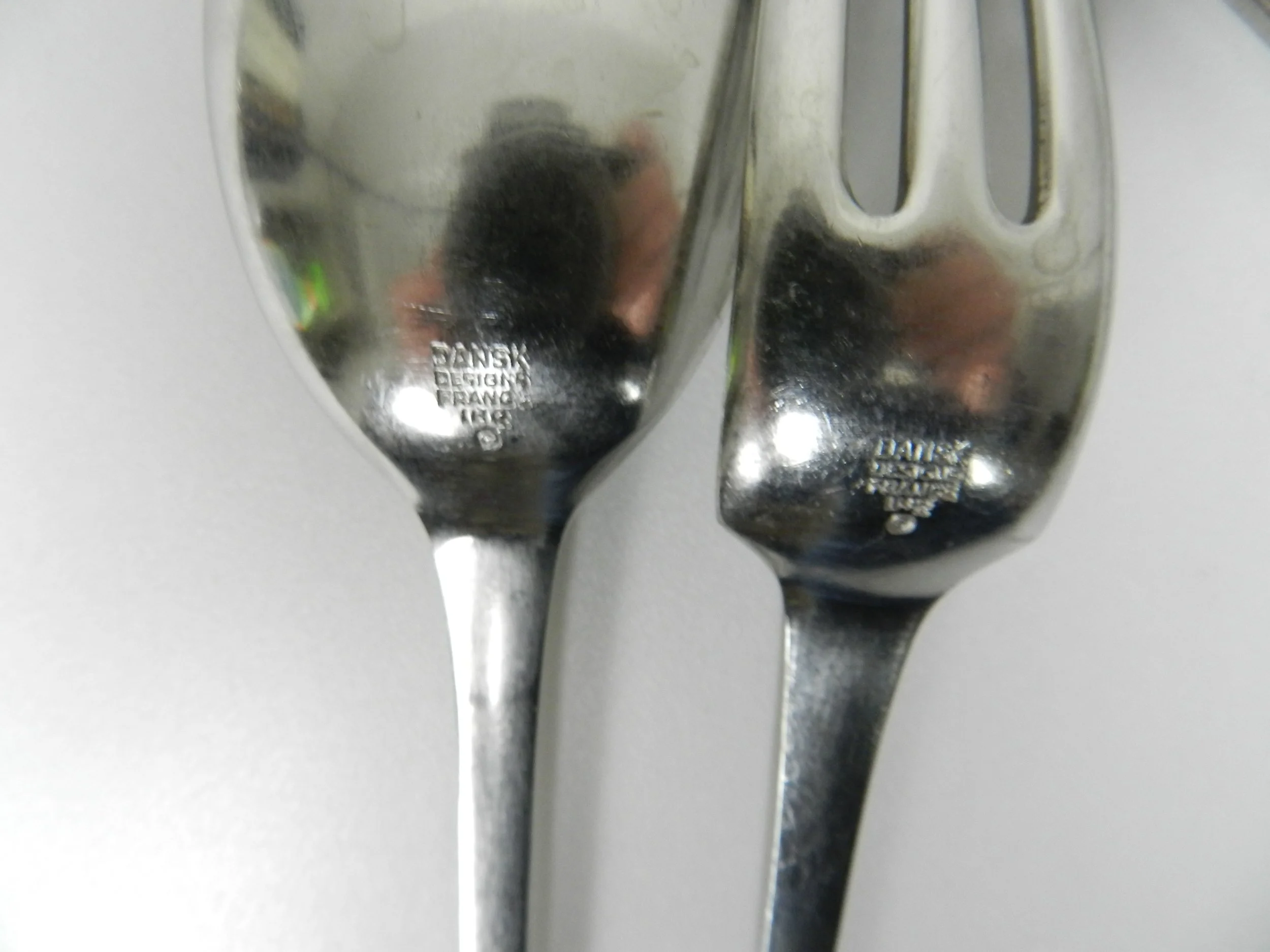 Stainless steel Thistle flatware set designed by Jens Quistgaard for Dansk. France, 1960s.